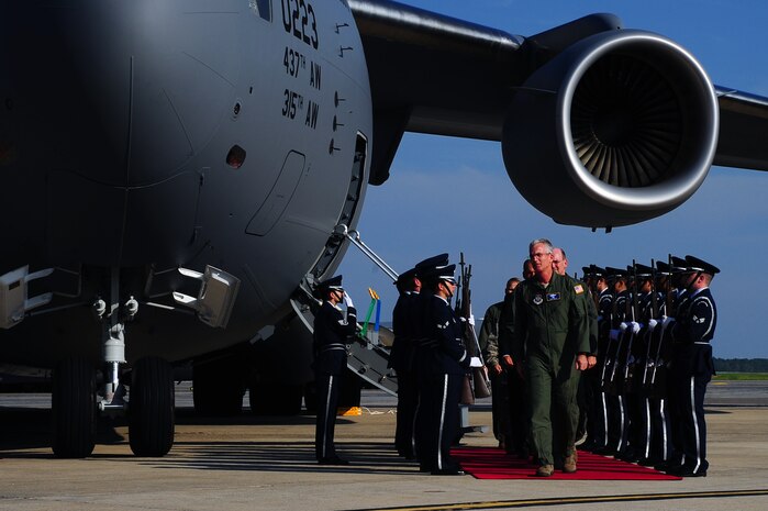 Gen. Paul Selva, Air Mobility Command commander,  exits the plane along with other distinguished visitors during a ceremony held to commemorate the delivery of the final U.S. Air Force C-17 Globemaster III, P-223,  Sept. 12, 2013, on the flight line at JB Charleston - Air Base, S.C. This historical event comes more than 20 years after the 437th Airlift Wing and the 315th Airlift Wing took delivery of the very first C-17 to enter the Air Force inventory June 14, 1993 and marks the successful completion of C-17 production for the U.S. Air Force. (U.S. Air Force photo/ Airman 1st Class Chacarra Neal)