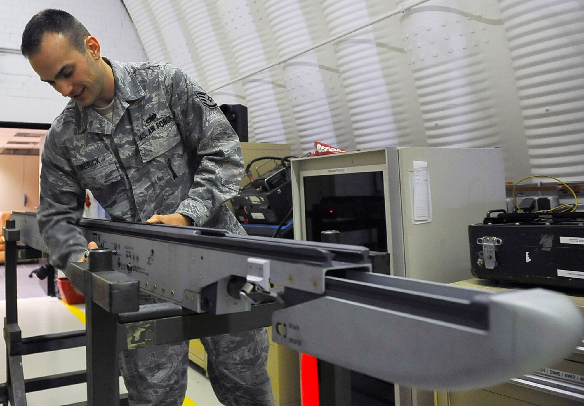 Staff Sgt. Timothy Emerick, 86th Material Maintenance Squadron aircraft armament systems technician, prepares to test a missile launcher attachment, Sept. 6, 2013, Ramstein Air Base, Germany. The 86th MMS Airmen store, maintain and account for WRM equipment for deployments downrange. (U.S. Air Force photo/Airmen Dymekre Allen)