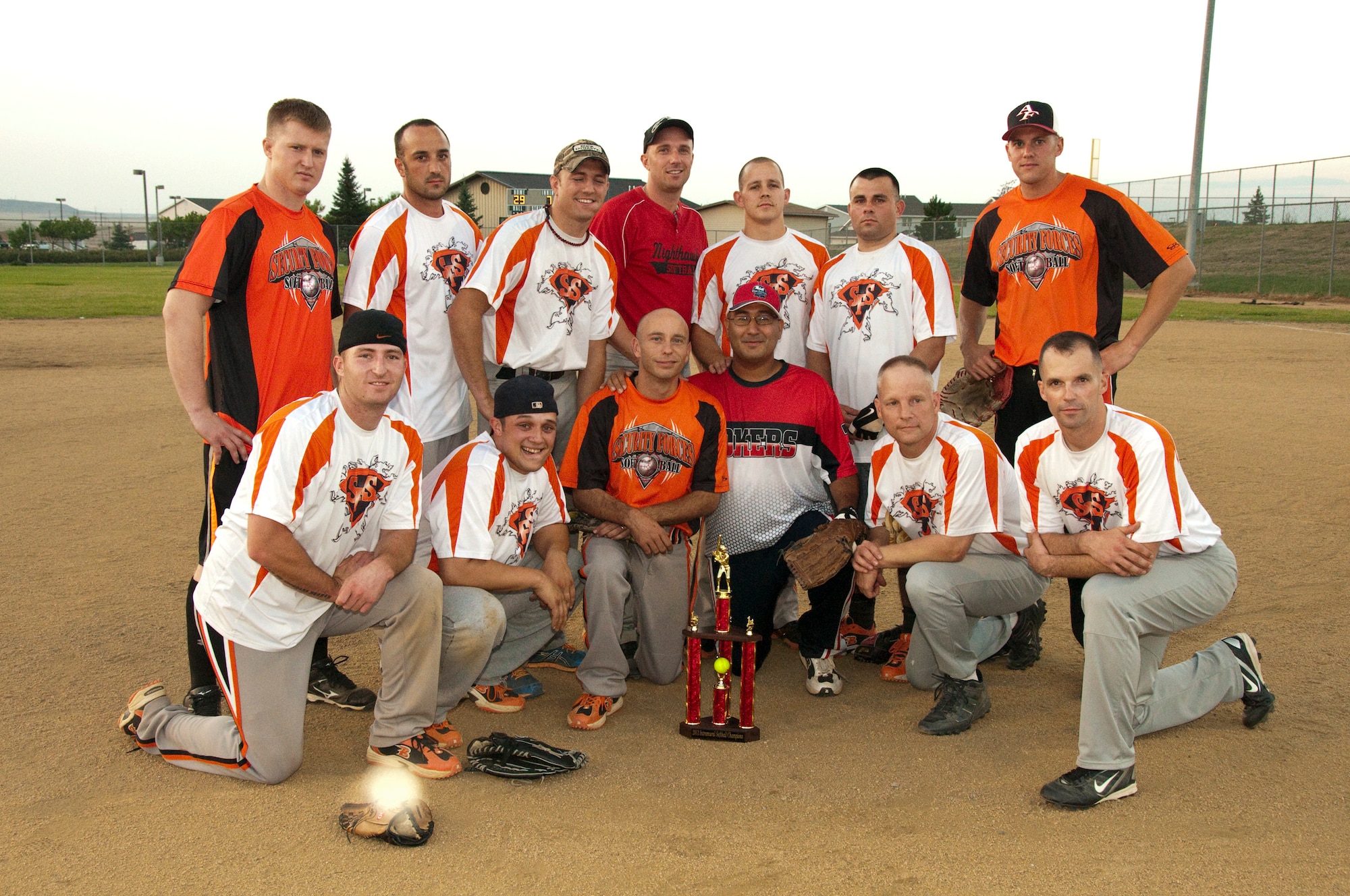 The 341st Security Forces Squadron intramural softball team poses for a photo after winning the championship game against the 741st Missile Security Forces Squadron Convoy Response Force team with a final score of 29 to 20. Pictured from left to right are: (back row) Senior Airman Samuel Smith, Tech. Sgt. Eric Johannes, Senior Airman Jacob Riggs, Master Sgt. James Nephew, Senior Airman Vincent Russell, Staff Sgt. Nicolas Capriato and Staff Sgt. James Fulcher. (Front row) Staff Sgt. Clayton Kraatz, Senior Airman Chris Barron, Tech. Sgt. Shane Mellish, Master Sgt. Francisco Santiago, Senior Master Sgt. Randy Bridenthal and Lt. Col. Steven Bauman. (Courtesy photo)