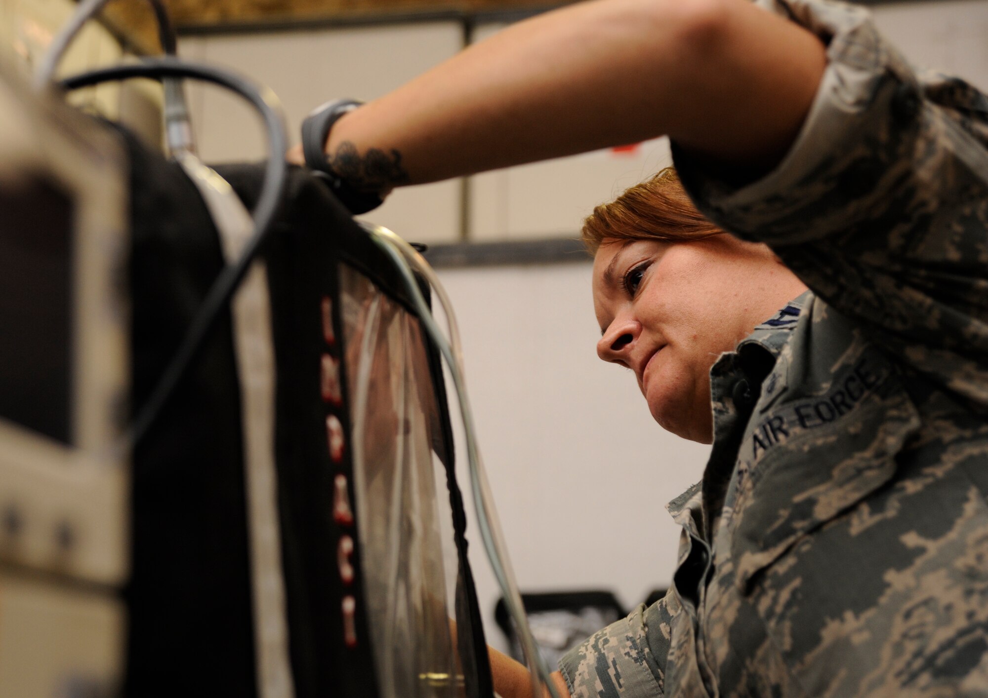 Capt. Cassidy Boyer connects an impact ventilator used to ventilate a patient under general anesthesia during a Mobile Field Surgical Team and Expeditionary Critical Care Team exercise at the 379th Air Expeditionary Wing in Southwest Asia, Sept. 6, 2013. Boyer is a 379th Expeditionary Medical Operations Squadron MFST certified nurse anesthetist deployed from Wright-Patterson Air Force Base, Ohio, and a Helena, Mont., native. (U.S. Air Force photo/Senior Airman Bahja J. Jones) 

