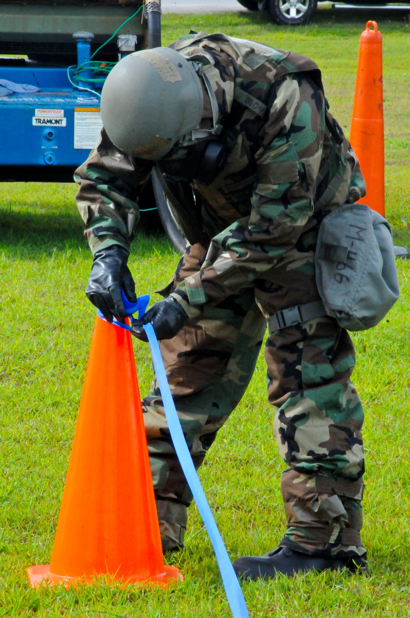 An Airman creates a cordon during a post-attack reconnaissance sweep scenario at the Ability to Survive and Operate Rodeo Sept. 13, 2013, on Andersen Air Force Base, Guam. Each sector had to respond simultaneously and accordingly to scenarios, demonstrating their ability to perform in heightened awareness situations during the rodeo. (U.S. Air Force photo by Airman 1st Class Amanda Morris/Released)