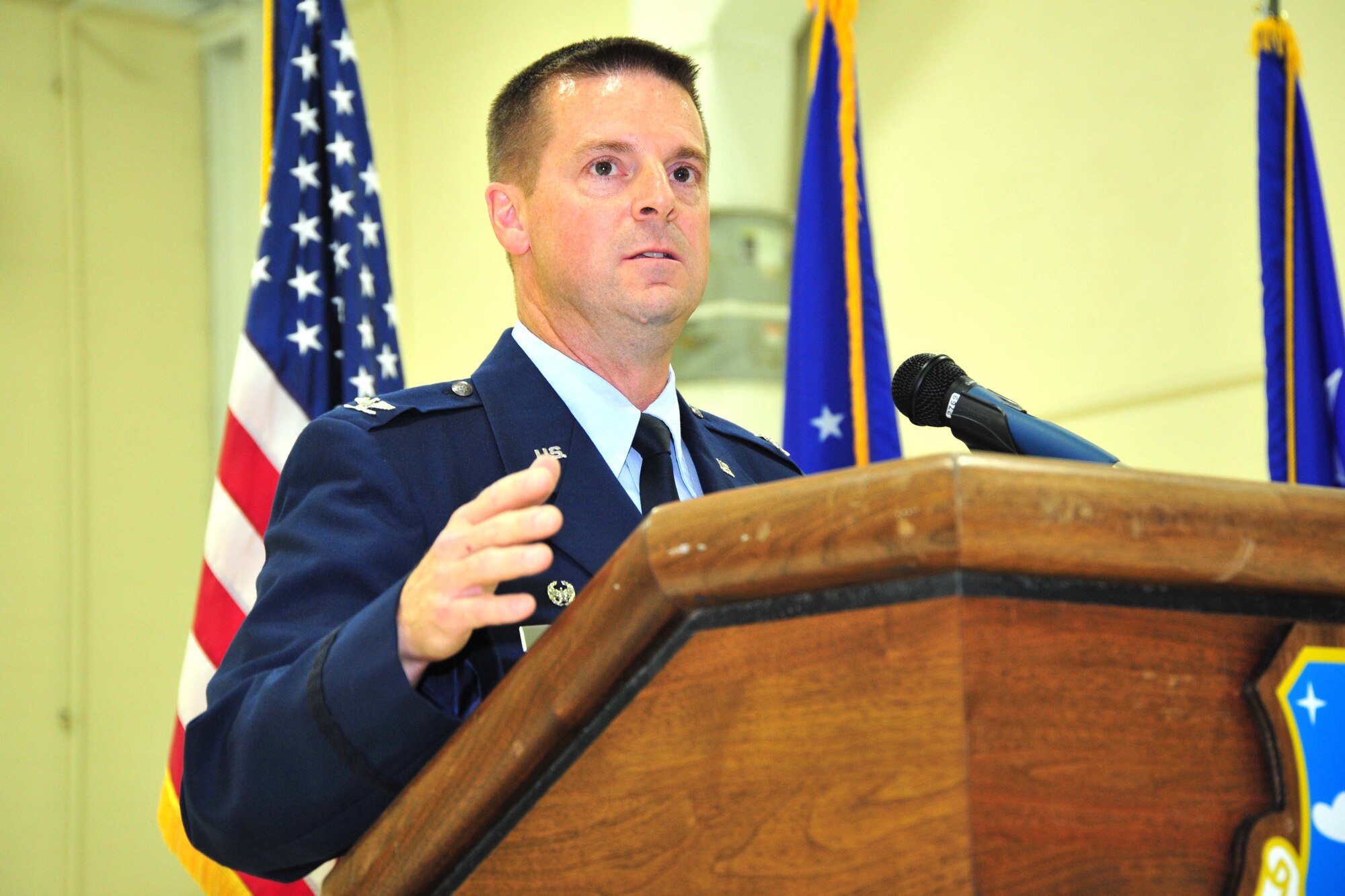 Colonel Frank Amodeo, 403rd Wing commander, addresses 403rd Wing members and distinguished visitors during an assumption of command ceremony held at Keesler Air Force Base, Miss. Amodeo assumed command of the 403rd Wing Sept. 14, 2013. (U.S. Air Force photo/Tech. Sgt. Ryan Labadens)