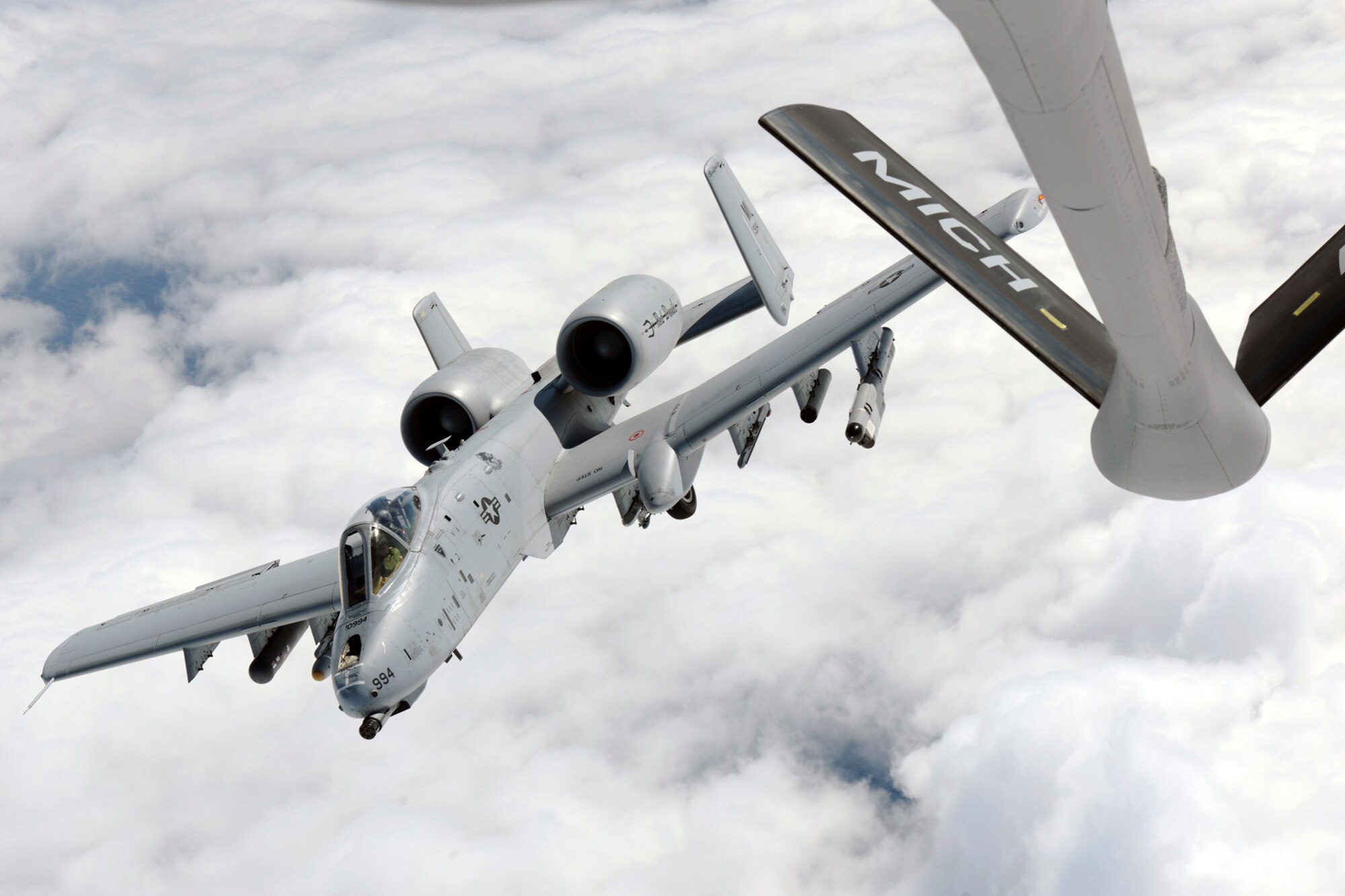 130913-Z-EZ686-175 -- An A-10C Thunderbolt II flown by the 107th Fighter Squadron, departs after completing air-to-air refueling from a KC135 Stratotanker flown by the 171st Air Refueling Squadron, while over the “Thumb” region of Michigan, Sept. 13, 2013. Both units are assigned to the Michigan Air National Guard and stationed at Selfridge Air National Guard Base, Mich. (U.S. Air National Guard photos by MSgt. David Kujawa/Released)
