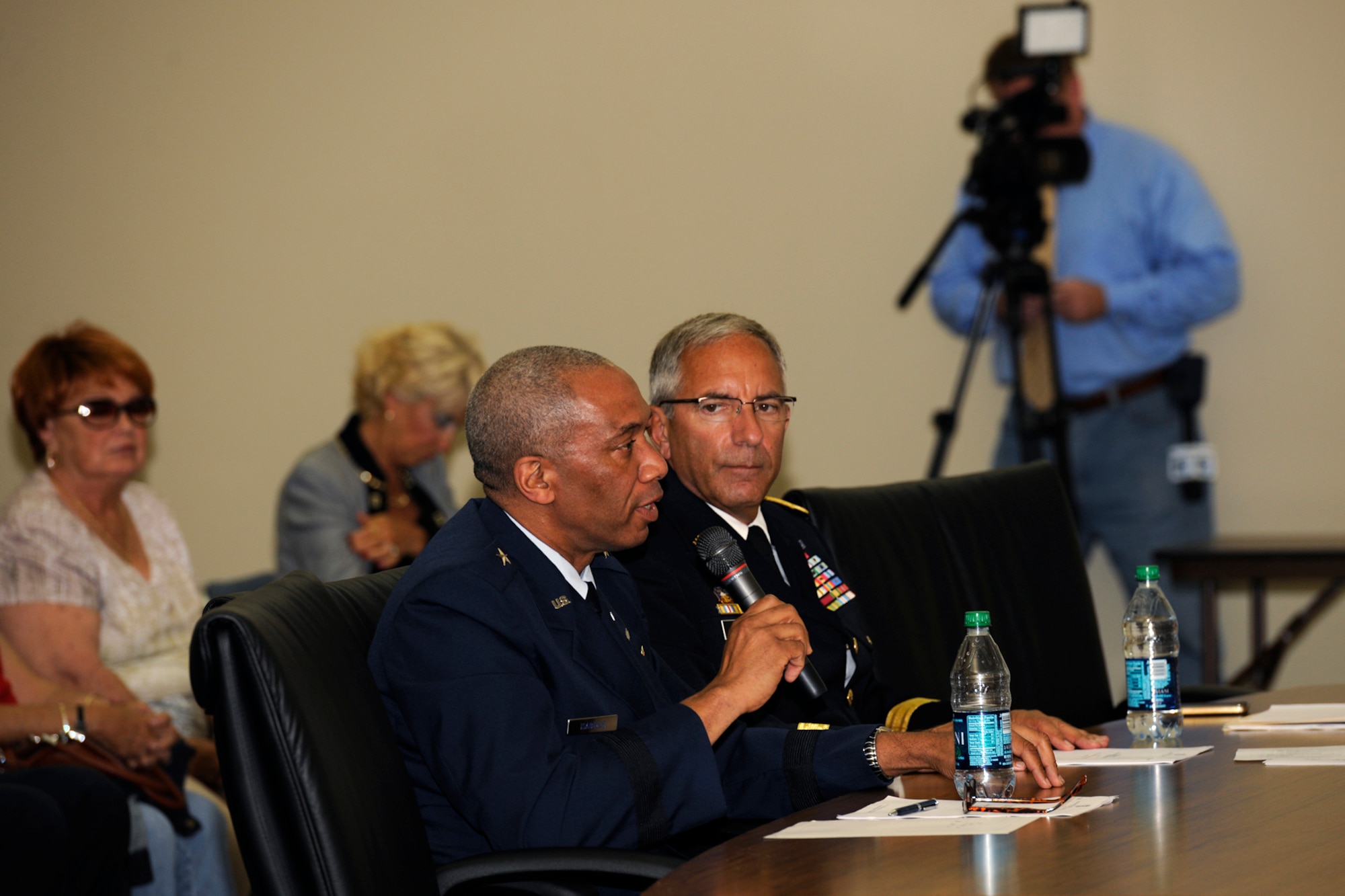 130914-Z-EZ686-136 – Major Gen. Gregory Vadnais listens as Brig. Gen. Leonard Isabelle testifies during a hearing of the National Commission of the Structure of the Air Force at the Chesterfield (Mich.) Township Hall, near Selfridge Air National Guard Base, Mich., Sept. 14, 2013. Vadnais is the adjutant general of Michigan. Isabelle is the commander of the Michigan Air National Guard. The generals, Airmen from around the Michigan ANG, and several community leaders provided testimony to the commission on the operations of the ANG and the relationship between the ANG and the local community. (U.S. Air National Guard photo by MSgt. David Kujawa/Released)