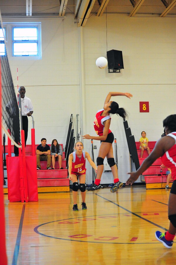 Marquis, senior, spikes a ball during a volleyball game against Emmanuel Christian School at Quantico Middle/High School on Sept. 9, 2013. The Lady Warriors beat their opponents maintaining their undefeated 2013 record.