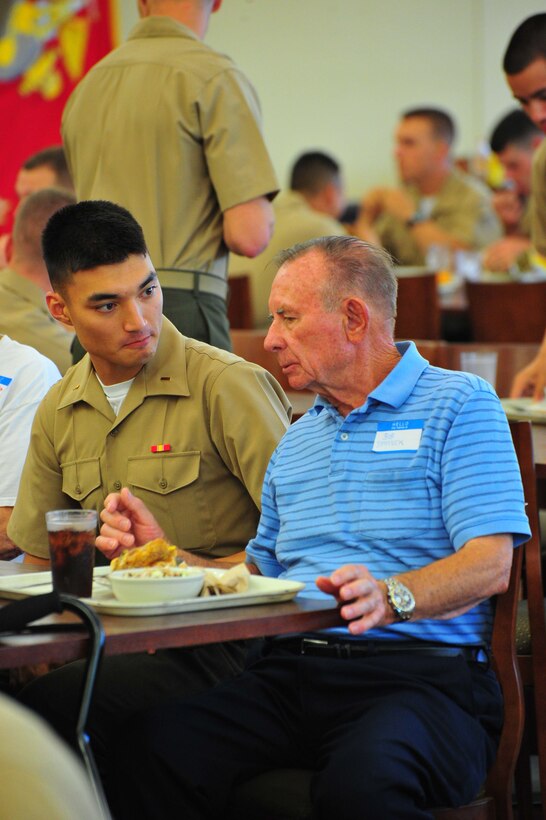 Robert Simanek eats lunch with Marine officers and fellow Marine veterans at Lopez Hall at The Basic School on Sept. 13, 2013. Simanek, a medal of honor recipient, was visiting TBS as part of a reunion. 