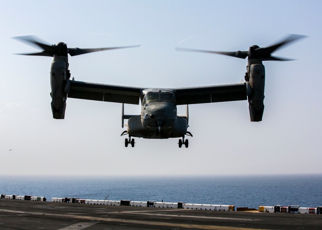 An MV-22B Osprey assigned to Marine Medium Tiltrotor Squadron (VMM) 266 (Reinforced), 26th Marine Expeditionary Unit (MEU), lands on the flight deck of the USS Kearsarge (LHD 3), at sea, Sept. 15, 2013. The 26th MEU is a Marine Air-Ground Task Force forward-deployed to the U.S. 5th and 6th Fleet areas of responsibility aboard the Kearsarge Amphibious Ready Group serving as a sea-based, expeditionary crisis response force capable of conducting amphibious operations across the full range of military operations. (U.S. Marine Corps photo by Sgt. Christopher Q. Stone, 26th MEU Combat Camera/Released)