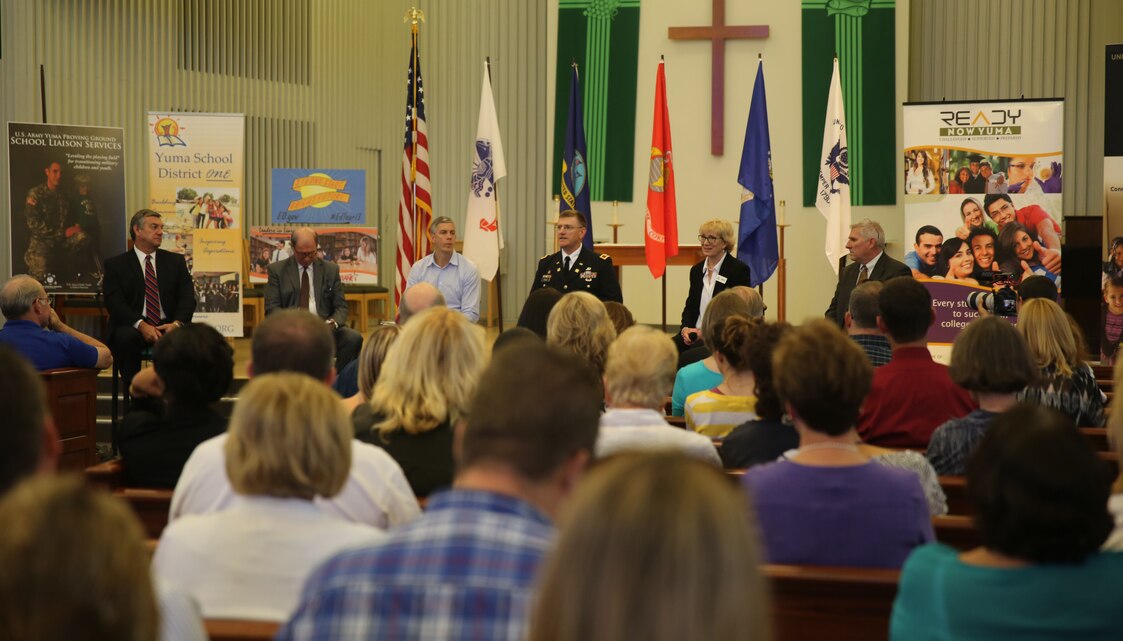 As part of his "Back to School" bus tour, Secretary of Education Arne Duncan visits Marine Corps Air Station Yuma, Ariz., Thursday. Panel members included superintendents from all school districts in Yuma to discuss various topics which included changes in school curriculum, effects of sequestration and the education of the military child. Military parents, Yuma education leaders, and teachers had the opportunity to attend the open forum discussion to voice questions and concerns on military children’s' education.