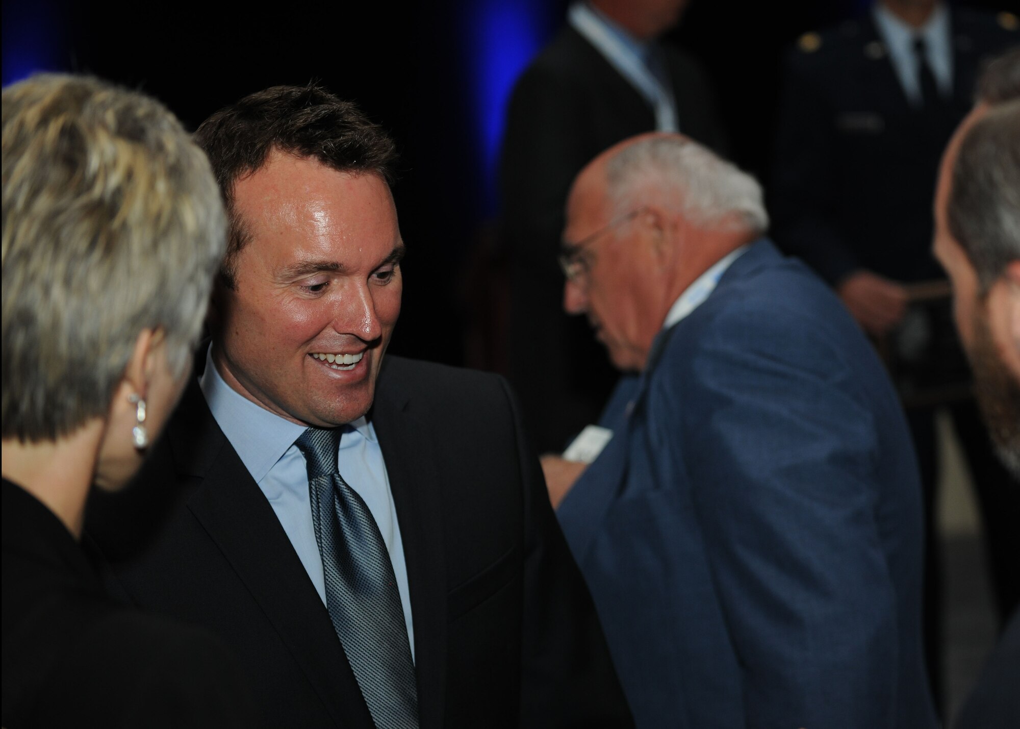 Acting Secretary of the Air Force Eric Fanning interacts with conference attendees at Air Force Association’s 2013 Air & Space Conference and Technology Exposition Sept. 16, 2013, Washington, D.C. Attendees have the opportunity to discuss important national defense issues during workshops, forums, seminars and major addresses by senior Air Force and aerospace industry leaders, academics, authors and subject matter experts. (U.S. Air Force photo/Airman 1st Class Aaron Stout)