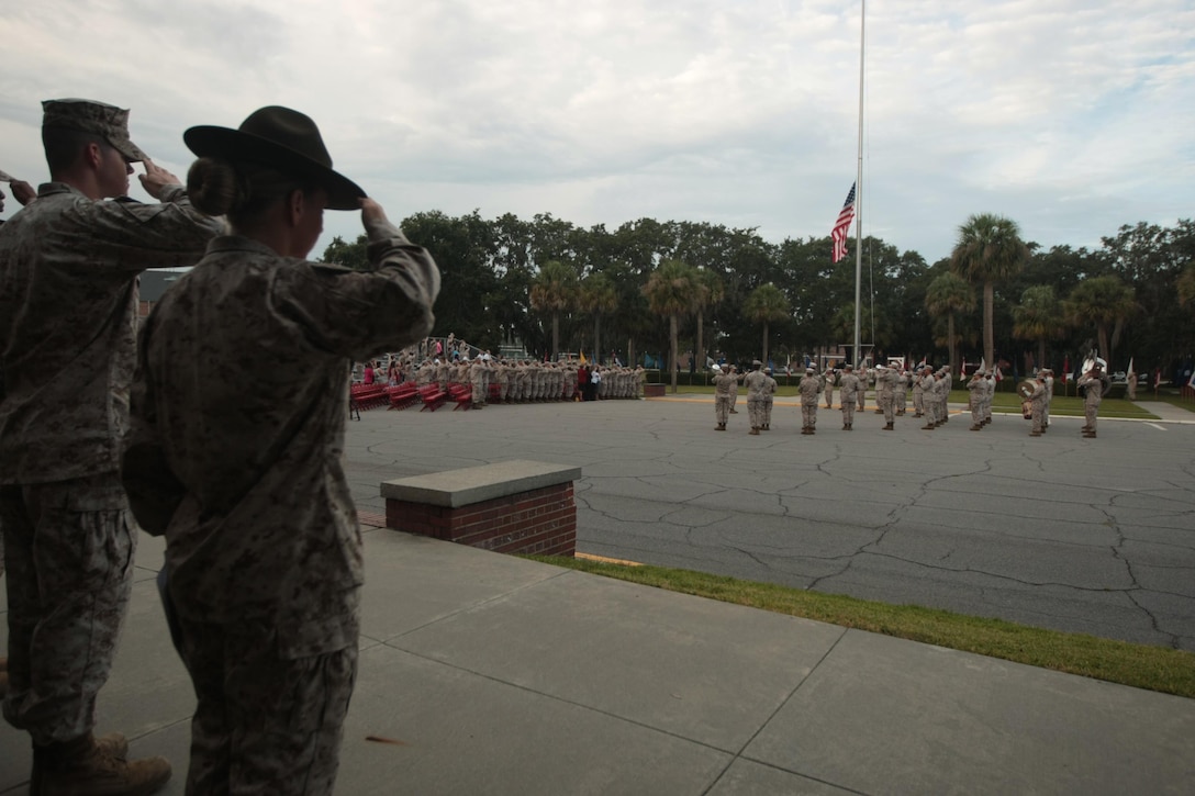 Marines from across Parris Island, S.C., salute the nation's flag Sept. 11, 2013, during a commemorative ceremony dedicated to the lives lost on 9/11. Terrorist attacks 12 years ago killed approximately 3,000 people, making it the greatest tragedy on U.S. soil since the Japanese attack on Pearl Harbor in 1941. (Photo by Cpl. Caitlin Brink)