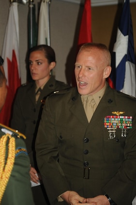 Brig. Gen. Thomas Loren, president, MCU, greets international officers during the Marine Corps University banquet at The Clubs at Quantico on Sept. 11, 2013. The banquet is held to show MCU appreciation for the international officers.