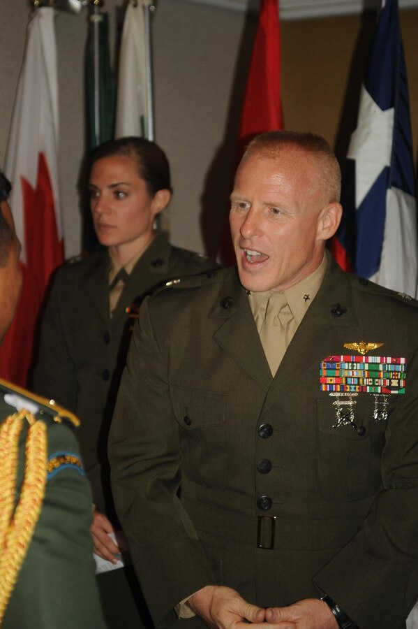 Brig. Gen. Thomas Loren, president, MCU, greets international officers during the Marine Corps University banquet at The Clubs at Quantico on Sept. 11, 2013. The banquet is held to show MCU appreciation for the international officers.
