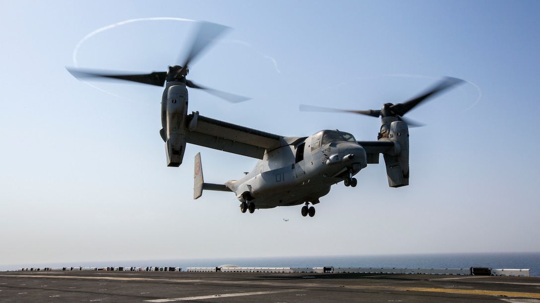 An MV-22B Osprey assigned to Marine Medium Tiltrotor Squadron (VMM) 266 (Reinforced), 26th Marine Expeditionary Unit (MEU), lands on the flight deck of the USS Kearsarge (LHD 3), at sea, Sept. 15, 2013. The 26th MEU is a Marine Air-Ground Task Force forward-deployed to the U.S. 5th and 6th Fleet areas of responsibility aboard the Kearsarge Amphibious Ready Group serving as a sea-based, expeditionary crisis response force capable of conducting amphibious operations across the full range of military operations. (U.S. Marine Corps photo by Sgt. Christopher Q. Stone, 26th MEU Combat Camera/Released)