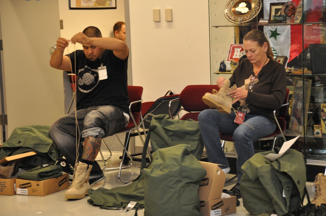 Deployees are issued uniforms and boots at the USACE Deployment Center as they prepare to deploy in support of contingency operations in the Middle East and Central Asia. 