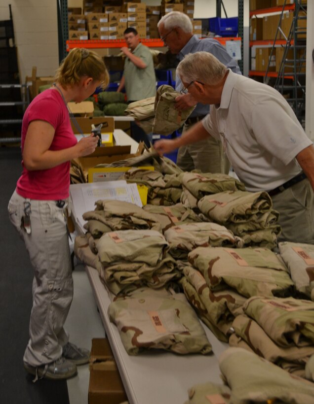 Deployees are issued uniforms and boots at the USACE Deployment Center as they prepare to deploy in support of contingency operations in the Middle East and Central Asia.  