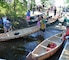 MCGREGOR, Minn. -- Members of the St. Croix Ojibwe Tribe launch their hand-made birchbark canoes at Big Sandy Lake, near McGregor, Minn., July 31. About 200 people gathered to remember the more than 400 Anishinaabe people that died during the winter of 1850-1851. (Photo by Patrick Moes)