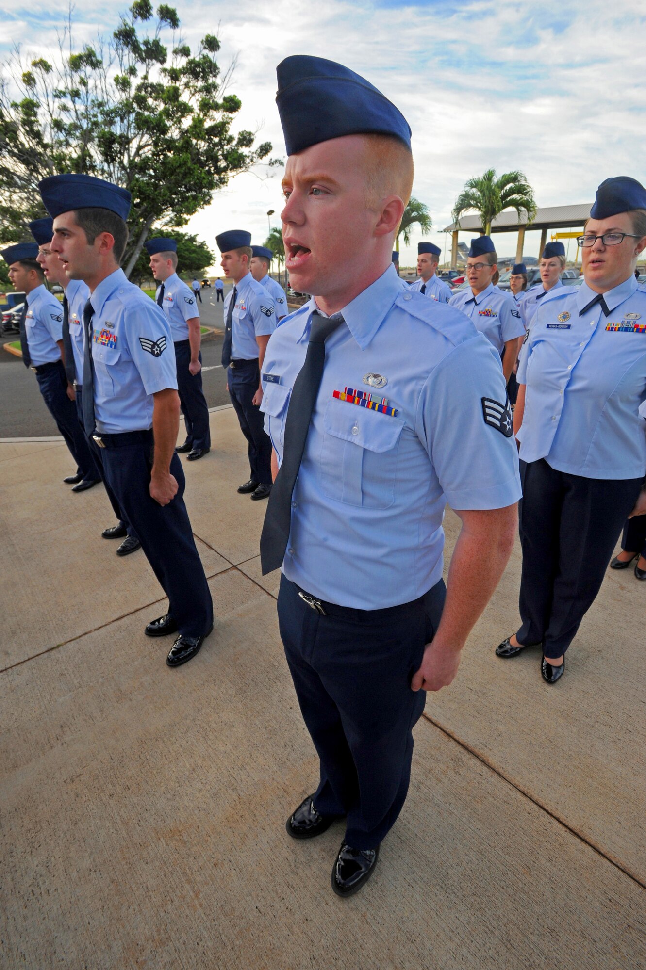 Airman Leadership School Class 13-D airmen recite the Airman’s Creed at the conclusion of a reveille ceremony dedicated to prisoners of war/missing in action at the Binnicker Professional Military Education Center at Joint Base Pearl Harbor-Hickam, Hawaii, Sept. 16, 2013.   (U.S. Air Force photo/Tech. Sgt. Jerome S. Tayborn)