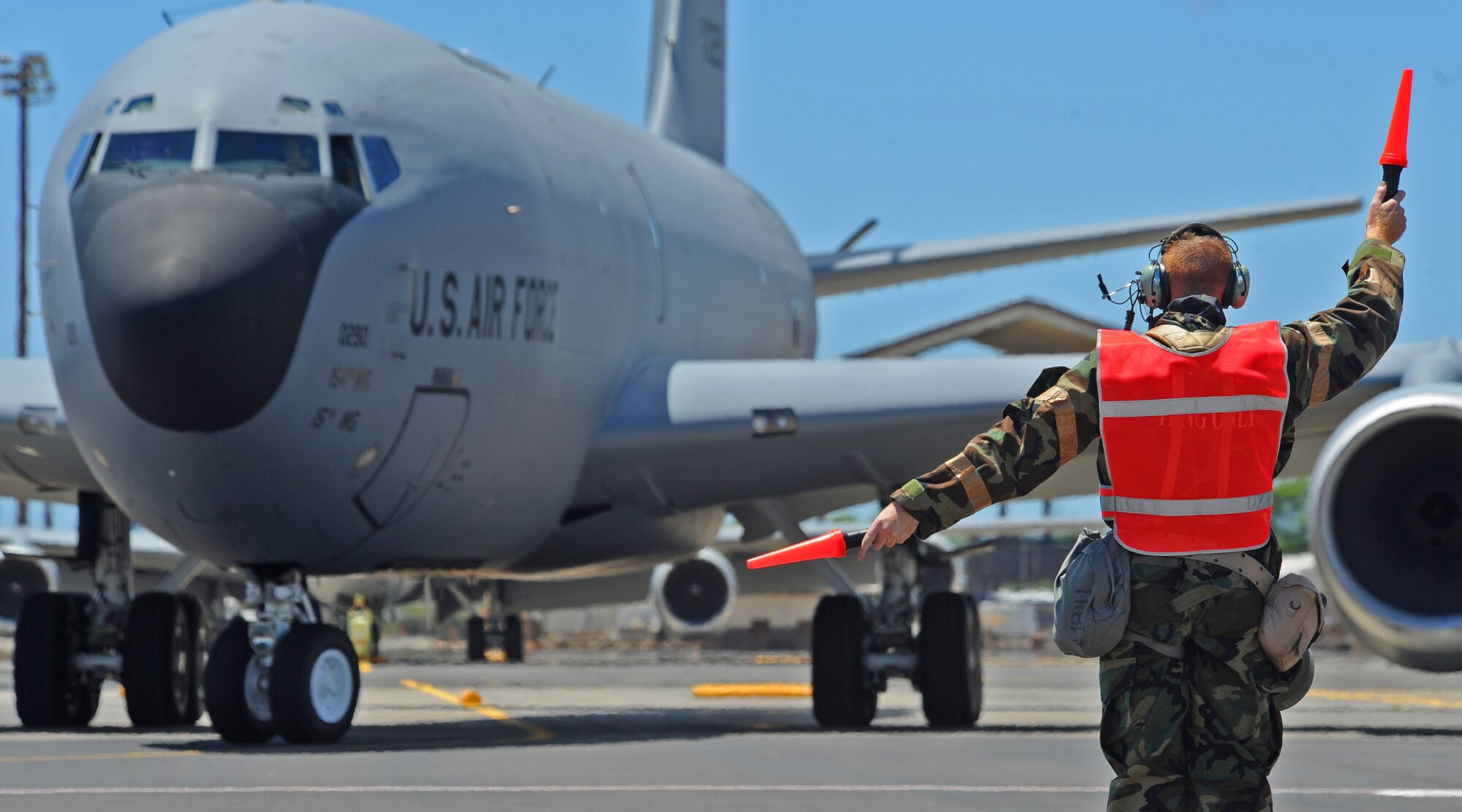 Staff Sgt. John Sciolto, Hawaii Air National Guard 154th Aircraft Maintenance Squadron crew chief prepare to launch a KC-135 Stratotanker on the flightline during an Operational Readiness Exercise at Joint Base Pearl Harbor-Hickam, Hawaii, Sept. 11, 2013. The refueling capabilities of the KC-135 aircraft are essential in today’s Air Force, and have been refueling the fleet for more than 50 years.  (U.S. Air Force photo/Tech. Sgt. Jerome S. Tayborn)