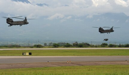Two 1-228 Aviation Battalion Chinook-47’s depart here carrying medical personnel and equipment from Joint Task Force-Bravo’s Medical Element and from the Honduran Ministry of Health Sept 16, 2013. The post conducts MSTs to enhance relations through medical assistance with regional and local civilian organizations while supporting the Ministry of Health’s efforts to provide medical care to the population.