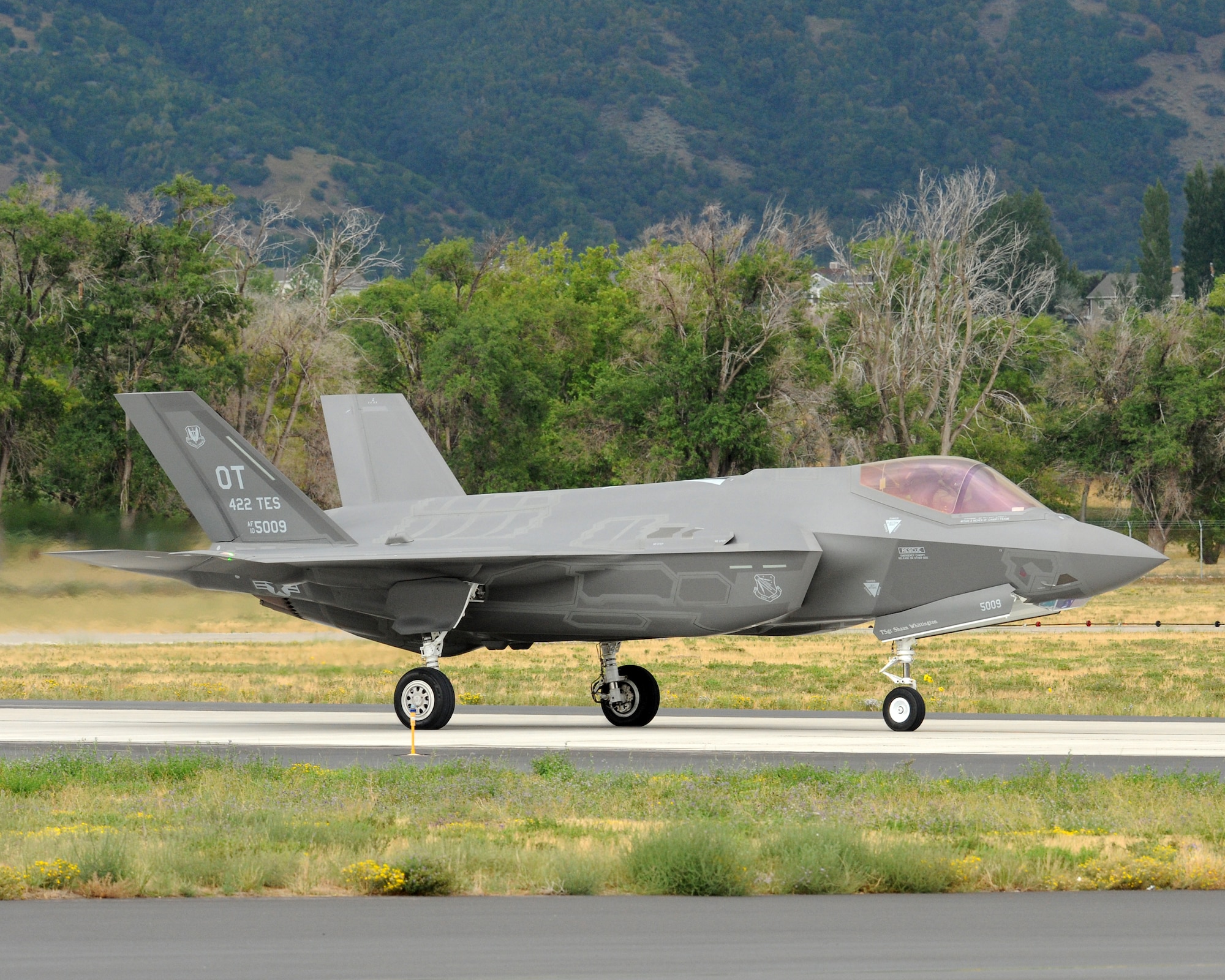 The first F-35A Lightning II Joint Strike Fighter ever to land at Hill Air Force Base, Utah, arrives here the afternoon of Sept. 13. The multirole, fifth-generation fighter arrived from the 422nd Test and Evaluation Squadron, Nellis AFB, Nev., and is scheduled to undergo post-production modifications at the Ogden Air Logistics Complex. Hill, Lockheed Martin and Utah elected officials will gather for a ceremony Sept. 20. The ceremony marks the beginning of depot maintenance of the F-35 at Hill AFB and is not a basing decision. (U.S. Air Force photo by Alex R. Lloyd/Released)