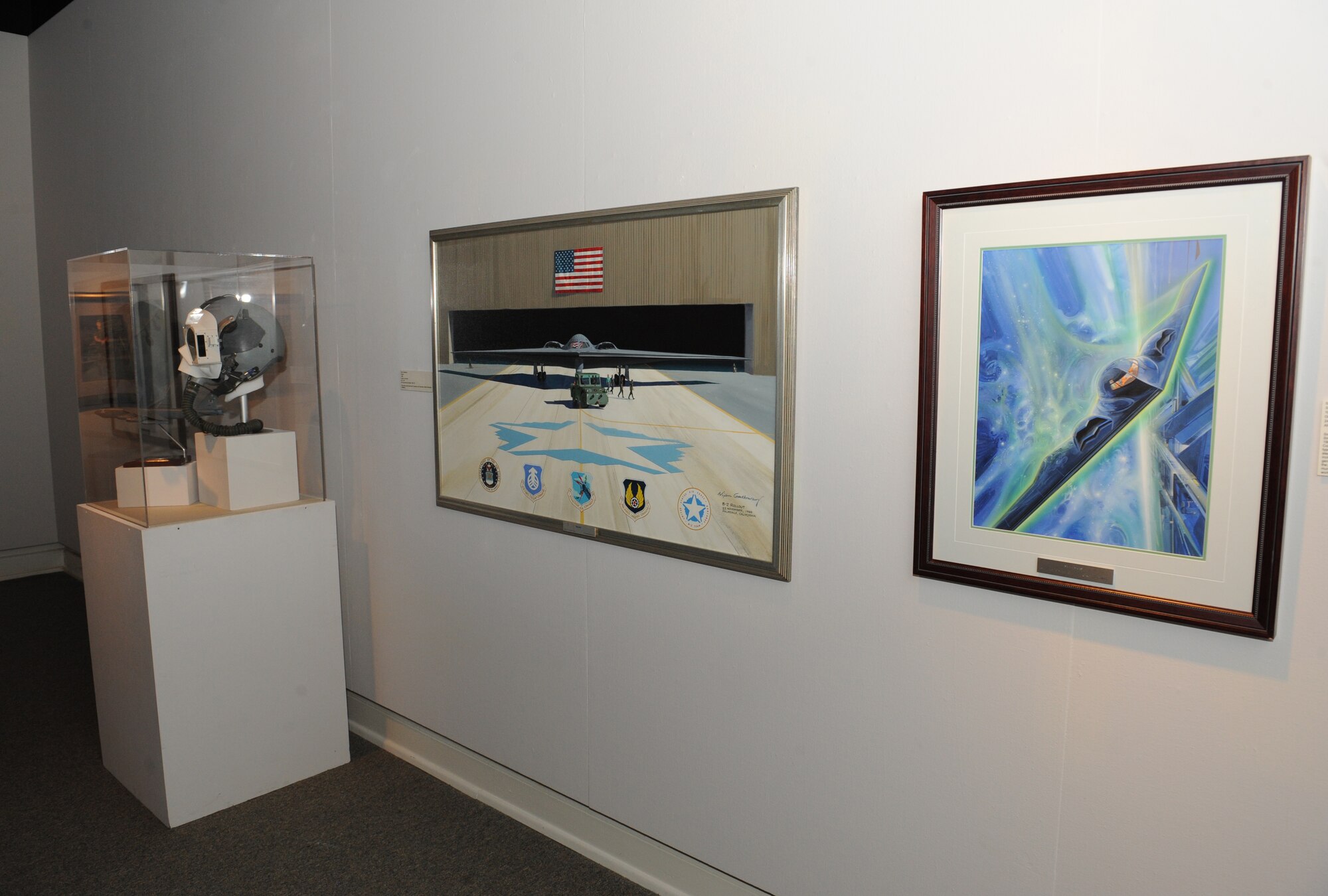 Artwork from the Air Force Art of the Atomic Age exhibit is on display in the Meadows Museum of Art, at Centenary College of Louisiana, Shreveport, La., Sept. 12, 2013. The selection is a good mix of art showcasing Air Force people, aircraft and missiles, all related to the very essence of Air Force Global Strike Command. (U.S. Air Force photo/Senior Airman Benjamin Gonsier)