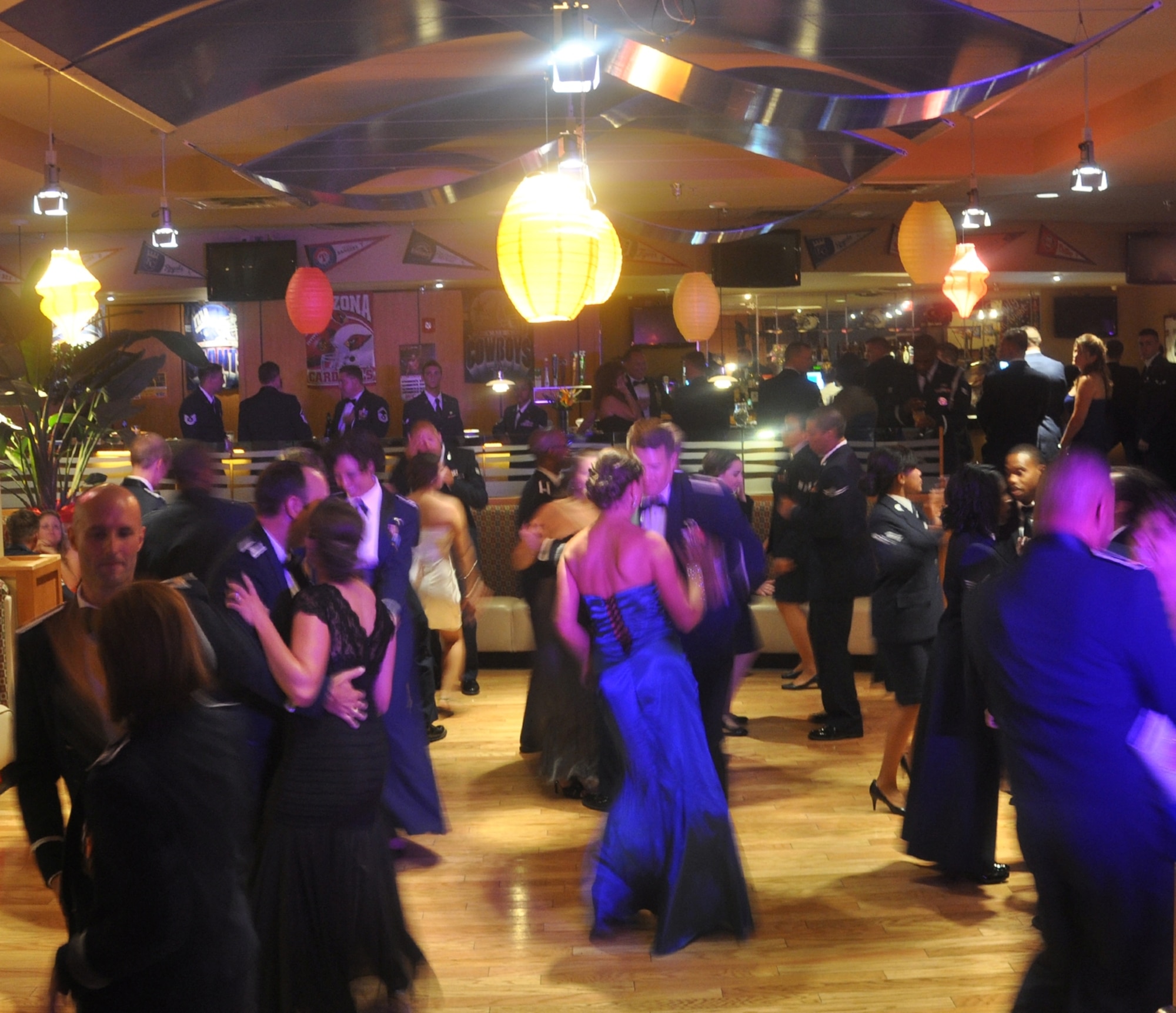 Team Tyndall members dance to salsa themed music and enjoy each other’s company at the 2013 Annual Air Force Ball at the Horizons Community Center, Sept. 14. (U.S. Air Force photo by Airman 1st Class Alex Echols)