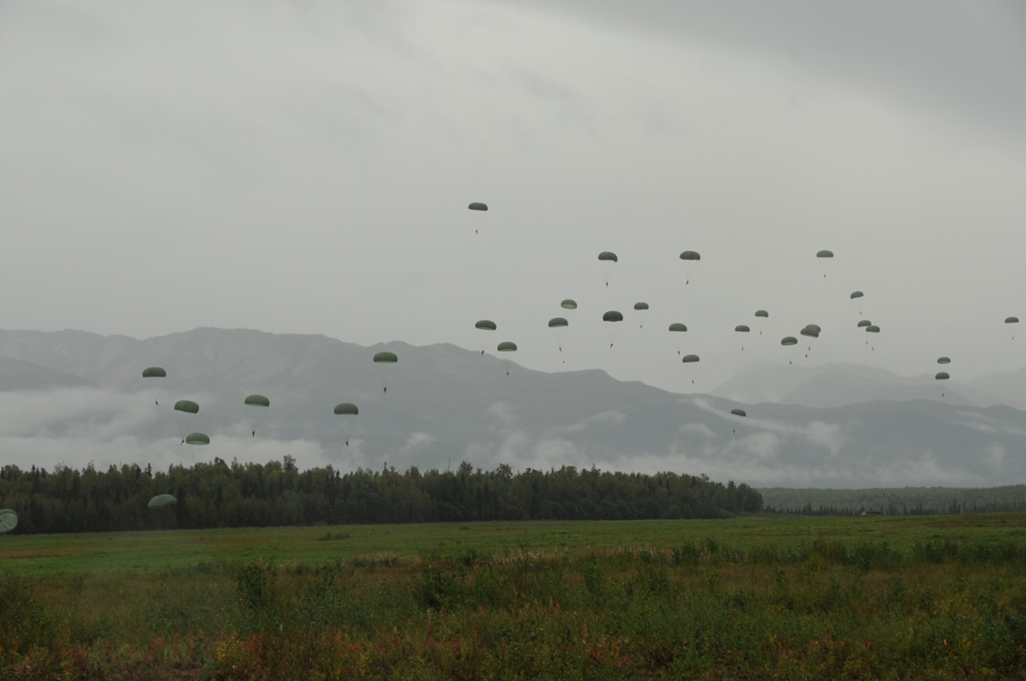 JOINT BASE ELMENDORF-RICHARDSON, Alaska -- Soldiers from the 6th Engineer Brigade jumped from a Marine Corps C130J as part of their aerial delivery training Sept. 6th. Marine Aerial Refueler Transport Squadron 152 (VMGR-152) flew 14 hours on three C-130Js, more than 7,400 miles, from tropical Okinawa to sub-arctic Alaska for two weeks to train at unique ranges and build their core mission skills on tactical navigation, aerial delivery and threat reaction. (U.S. Air Force Photo/Airman 1st Class Omari Bernard)