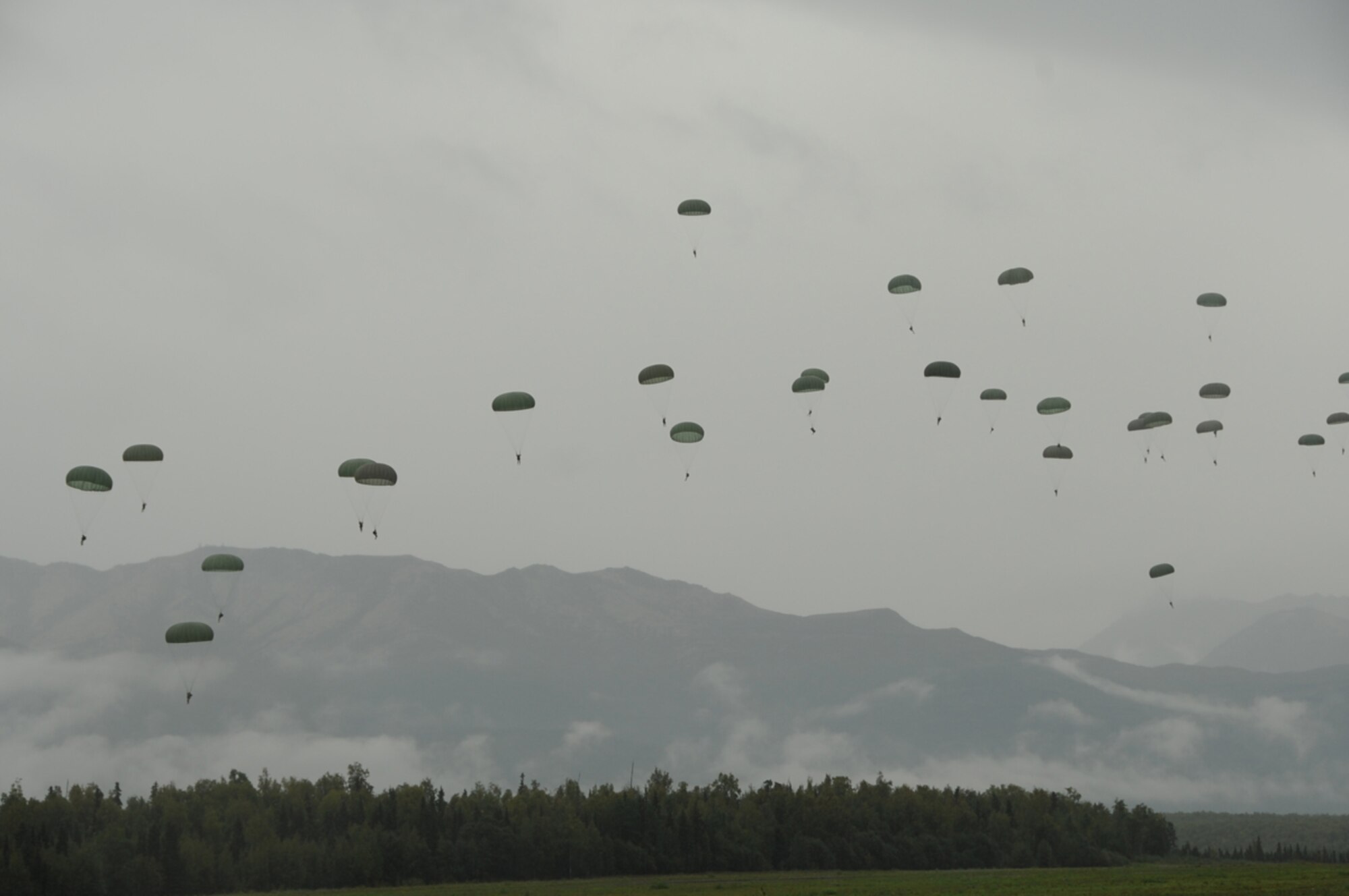 JOINT BASE ELMENDORF-RICHARDSON, Alaska -- Soldiers from the 6th Engineer Brigade jumped from a Marine Corps C130J as part of their aerial delivery training Sept. 6th. Marine Aerial Refueler Transport Squadron 152 (VMGR-152) flew 14 hours on three C-130Js, more than 7,400 miles, from tropical Okinawa to sub-arctic Alaska for two weeks to train at unique ranges and build their core mission skills on tactical navigation, aerial delivery and threat reaction. (U.S. Air Force Photo/Airman 1st Class Omari Bernard)