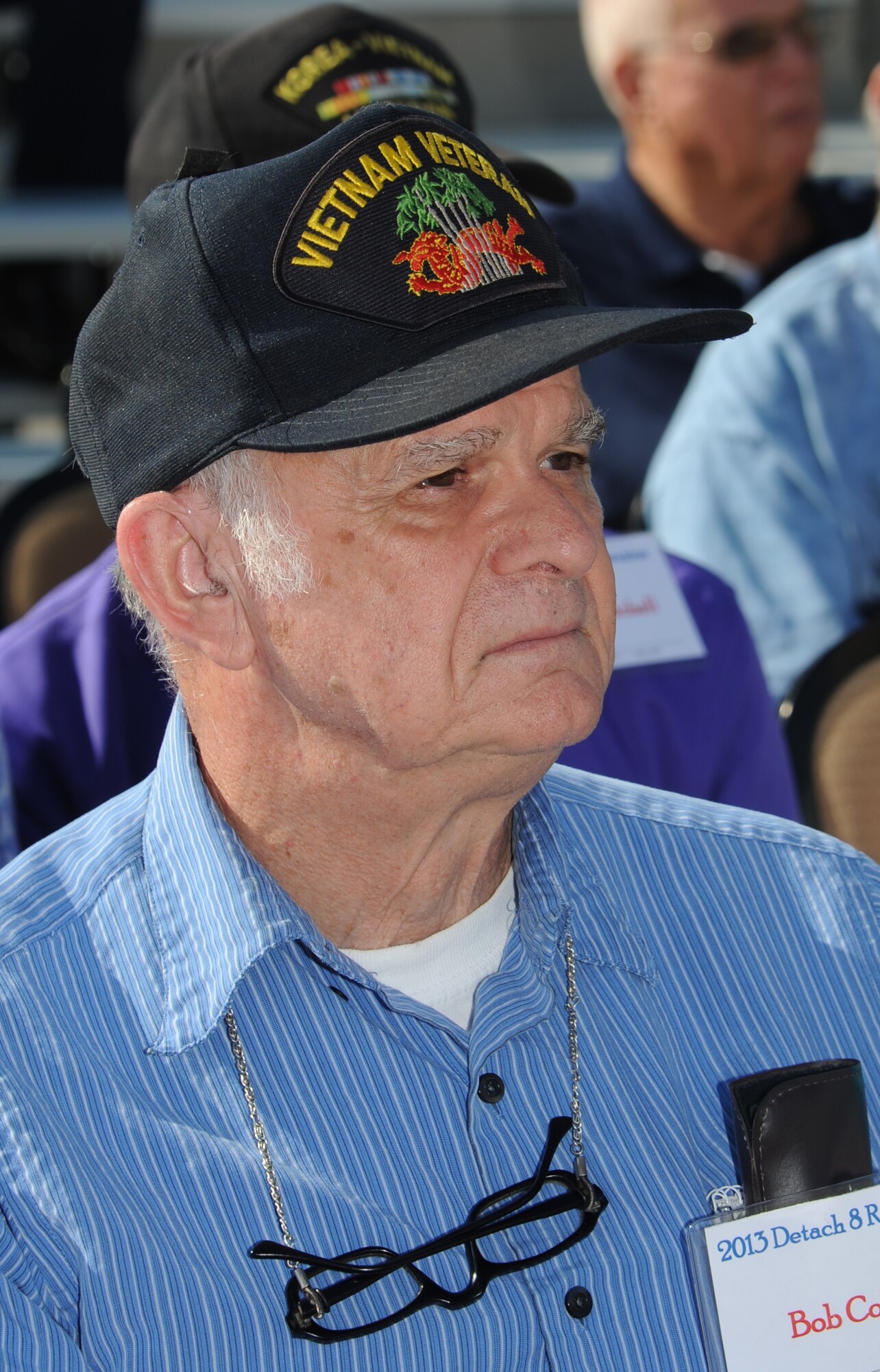 Bob Cole, retired Air Force and Air National Guard member, attends the street dedication ceremony honoring a former technical training student, Chief Master Sgt. Richard Etchberger, Sept. 16, 2013, Keesler Air Force Base, Miss. Etchberger’s son, Cory Etchberger, assisted with the unveiling of a street sign and a memorial stone at the event.  (U.S. Air Force photo by Kemberly Groue)