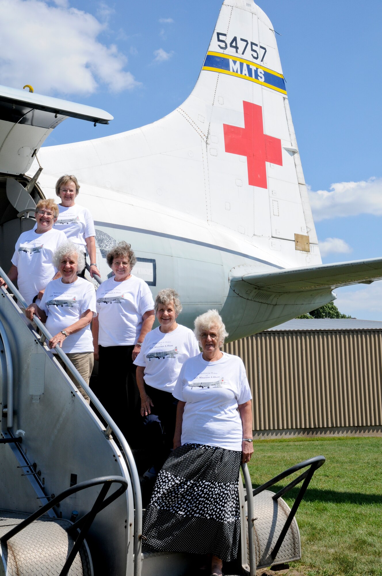 The members of the St. Paul based, Minnesota Air Guard, 109th Aeromedical Evacuation Squadron participated in a founders reunion on Aug 17, 2013. The reunion included an unveiling of a Red Cross on the base’s Convair C‐131 in honor of Col. Maureen A. Hunt, former Strategic Air Command, Chief Nursing Services and her lasting impact on the 109th Aeromedical Evacuation Squadron.