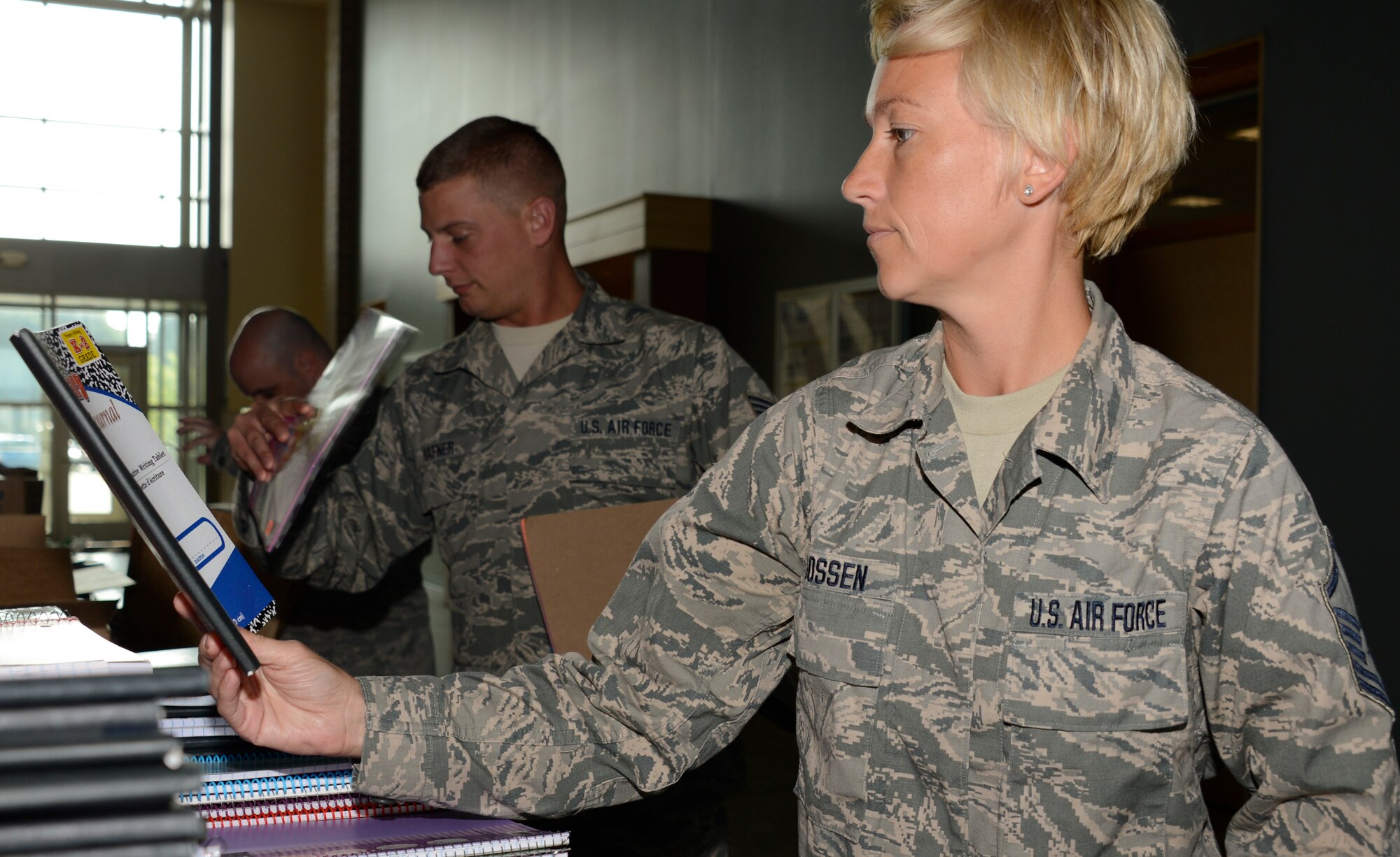 Master Sgt. Amy Goossen, 133rd Maintenance Group, gathers school supplies for her children in St. Paul, Minn., Aug. 15, 2013. The school supplies were donated from Dollar Tree store customers throughout the Twins Cities area in support of Operation Homefront and the Back-to-School-Brigade.  

(U.S. Air National Guard photo by Tech. Sgt. Amy M. Lovgren/ Released) 
