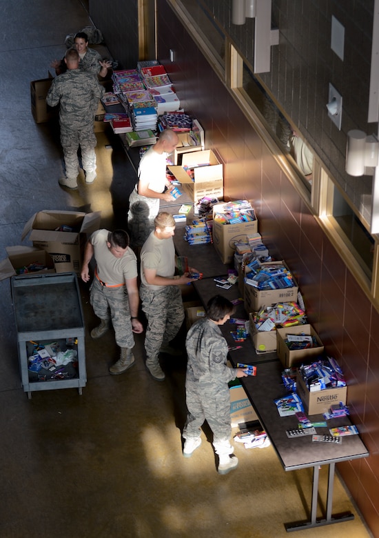 Airmen from the 133rd Airlift Wing volunteer to sort school supplies in St. Paul, Minn., Aug. 15, 2013. The school supplies were donated from customers at Dollar Trees stores throughout the Twin Cities area in support of Operation Homefront and the Back-to-School-Brigade.  

(U.S. Air National Guard photo by Tech. Sgt. Amy M. Lovgren/ Released) 

(U.S. Air National Guard photo by Tech. Sgt. Amy M. Lovgren/ Released) 

