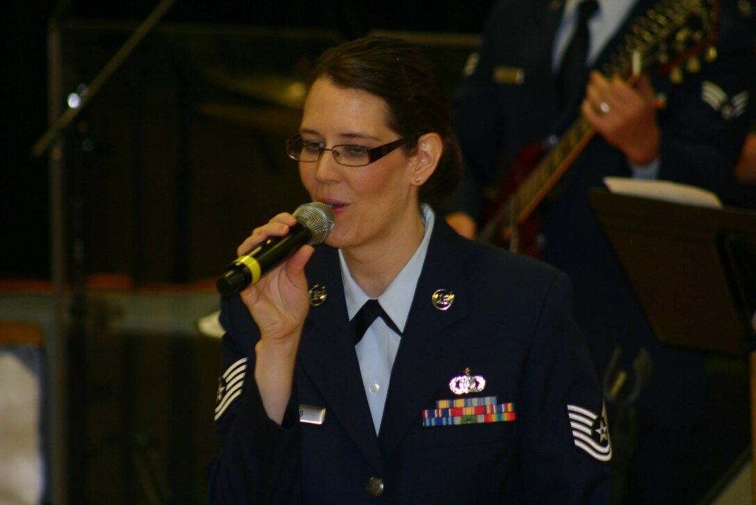 TSGT Lori Reeves sings during a performance in Oneida, TN on June 23, 2013