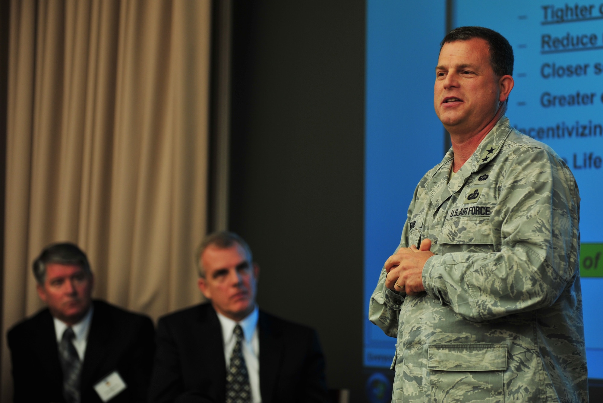 U.S. Air Force Maj. Gen. Dwyer Dennis, Air Force Life Cycle Management Center, fighters and bombers program executive officer, speaks during an Innovation Opportunities Panel Discussion at Langley Air Force Base, Va., Sept. 12, 2013. The panel was part of the Air Combat Command Air Superiority Innovation Summit. (U.S. Air Force photo by Staff Sgt. Jarad A. Denton/Released)