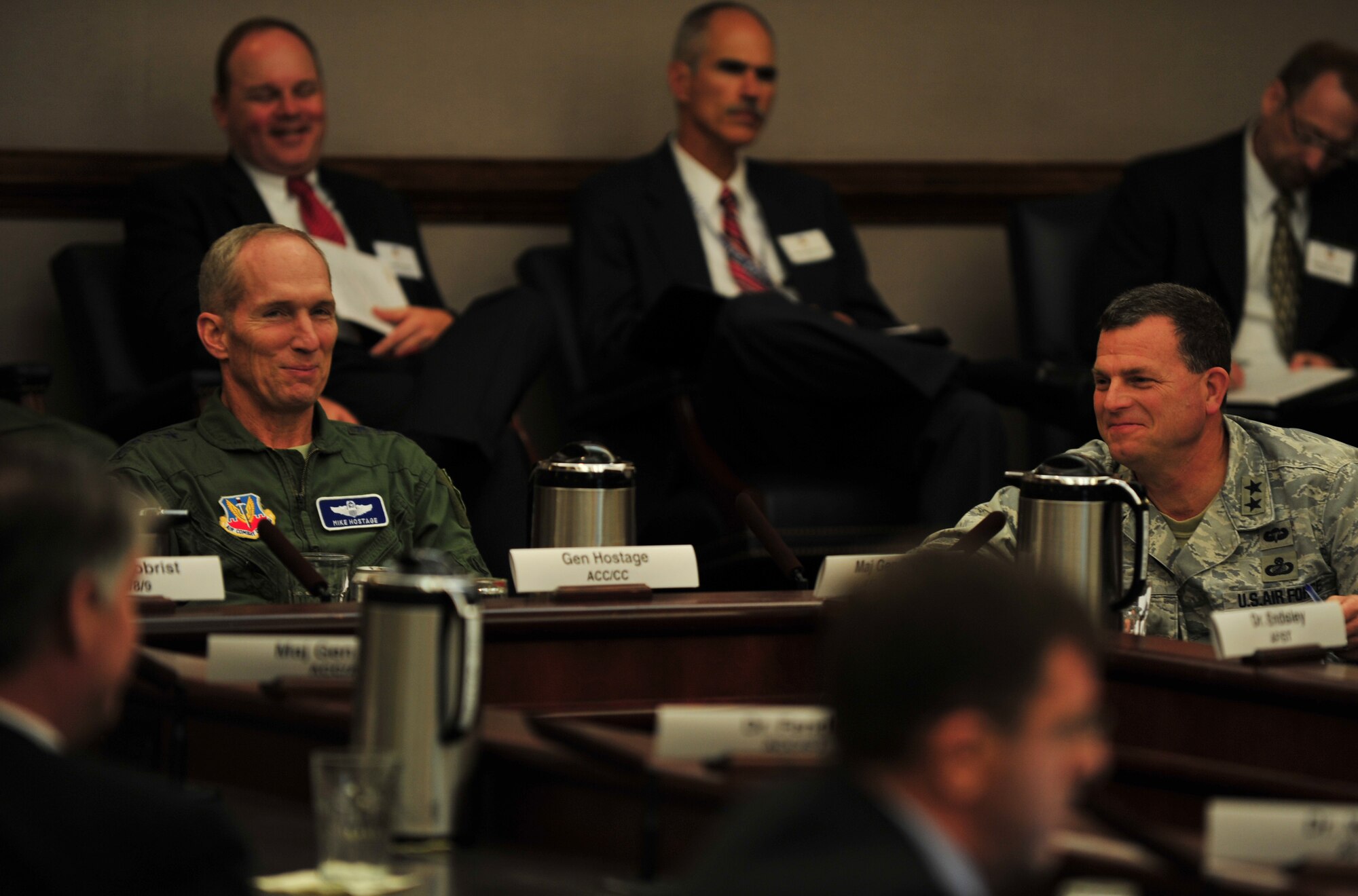 U.S. Air Force Gen. Mike Hostage, Air Combat Command commander, engages in a discussion regarding future initiatives, during the ACC Air Superiority Innovation Summit, at Langley Air Force Base, Va., Sept. 12, 2013. During the summit, several programs were measured against the projected future operating environment of the Air Force. (U.S. Air Force photo by Staff Sgt. Jarad A. Denton/Released)