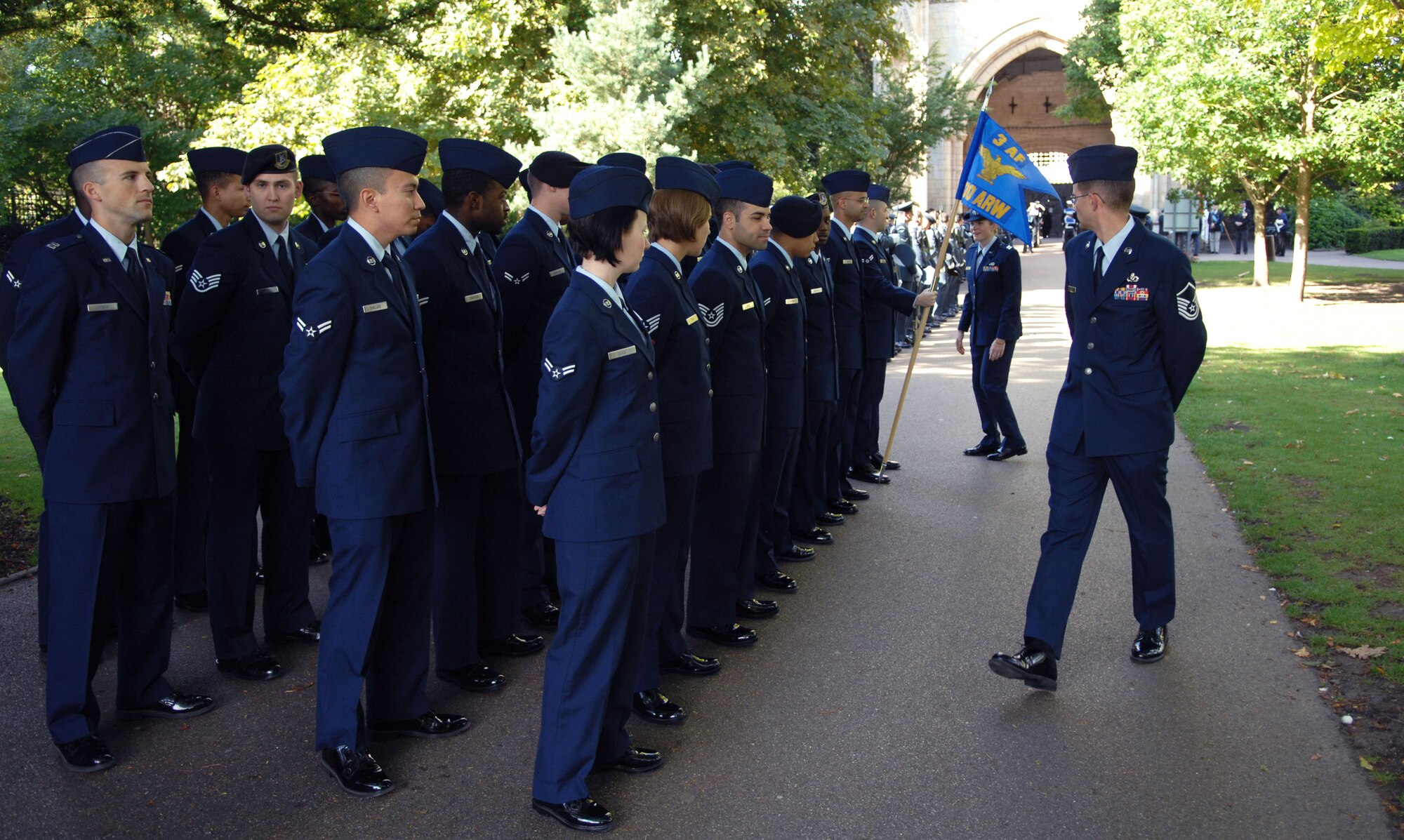 Team Mildenhall members form up Sept. 15, 2013, before the Battle of Britain memorial parade in Bury St. Edmunds, England. The parade paid tribute to the battle the Royal Air Force fought in 1940 against the Luftwaffe. The battle proved to be a turning point for Britain in World War II, and is commemorated every year on Sept. 15. (U.S. Air Force photo by Airman 1st Class Dillon Johnston/Released)