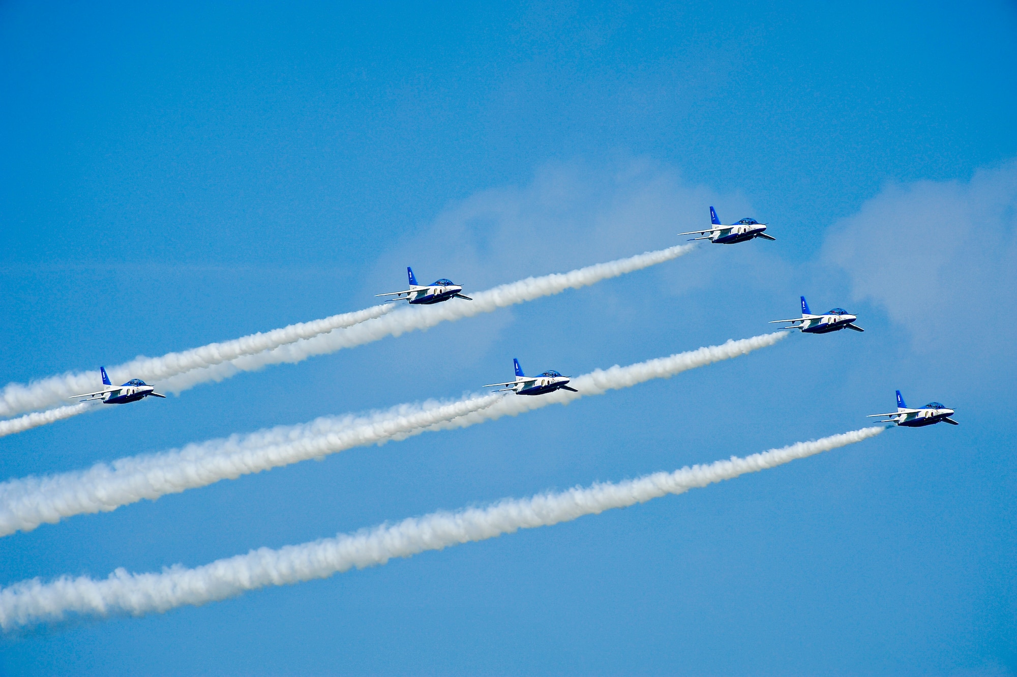 The Japan Air Self-Defense Force's demonstration team, Blue Impulse, performs an aerial maneuver during a practice over Misawa Air Base, Japan, Sept. 14., 2013. The Blue Impulse visit Misawa AB in conjunction with the annual air festival, which features aircraft from the U.S. Air Force, U.S. Navy and JASDF. (U.S. Air Force photo by Staff Sgt. Nathan Lipscomb)