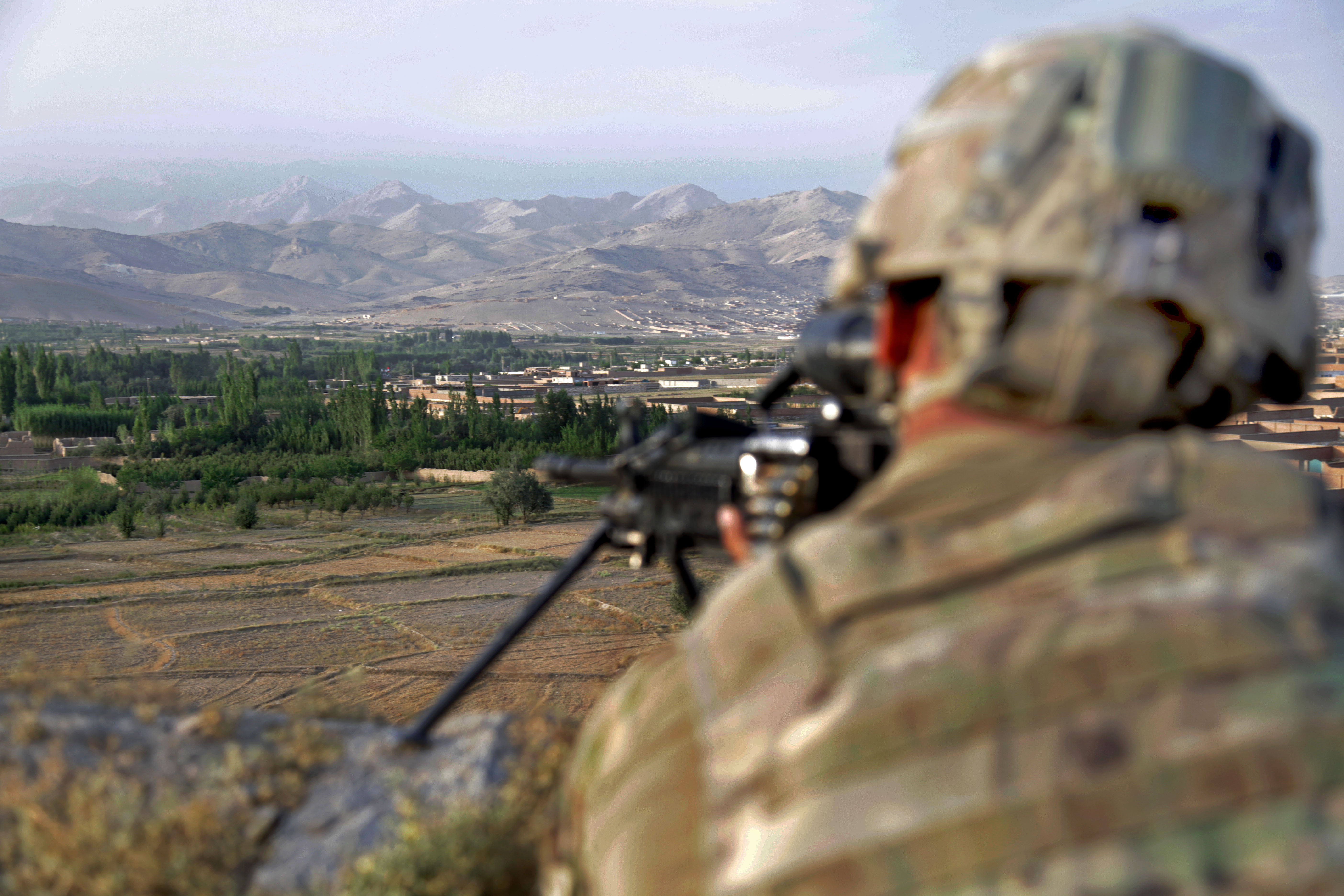 U S Army Pfc Michael Padilla Provides Overwatch From The Mountains Of 