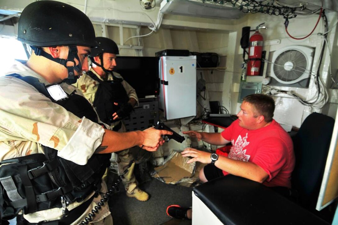 U.S. sailors conduct boarding and search training aboard the Royal ...