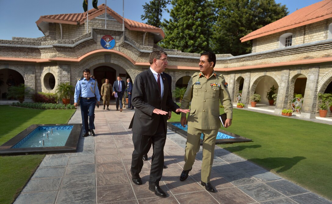 U.S. Deputy Defense Secretary Ash Carter walks with Gen. Khalid Shameem Wynne, chairman of Pakistan's joint chiefs of staff, to his awaiting motorcade after the two met during Carter's visit to Islamabad, Sept. 16, 2013.