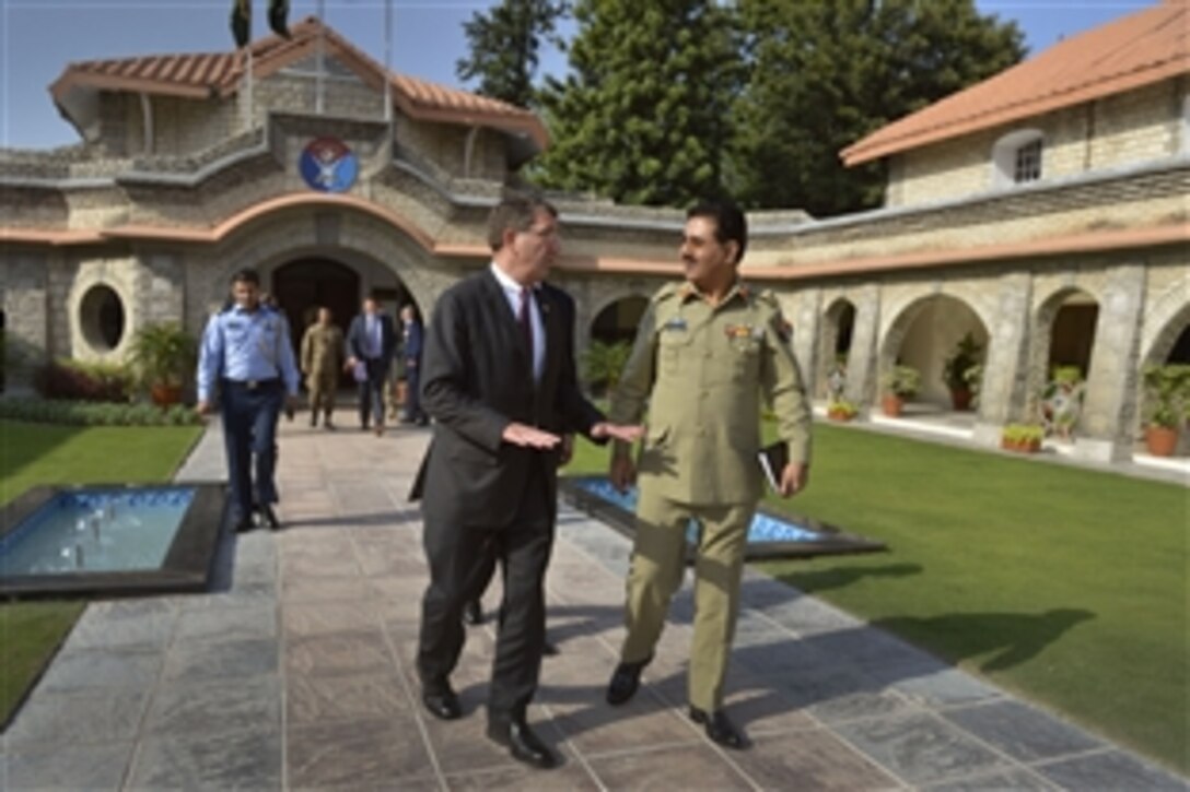 U.S. Deputy Defense Secretary Ash Carter walks with Gen. Khalid Shameem Wynne, chairman of Pakistan's joint chiefs of staff, to his awaiting motorcade after the two met during Carter's visit to Islamabad, Sept. 16, 2013.