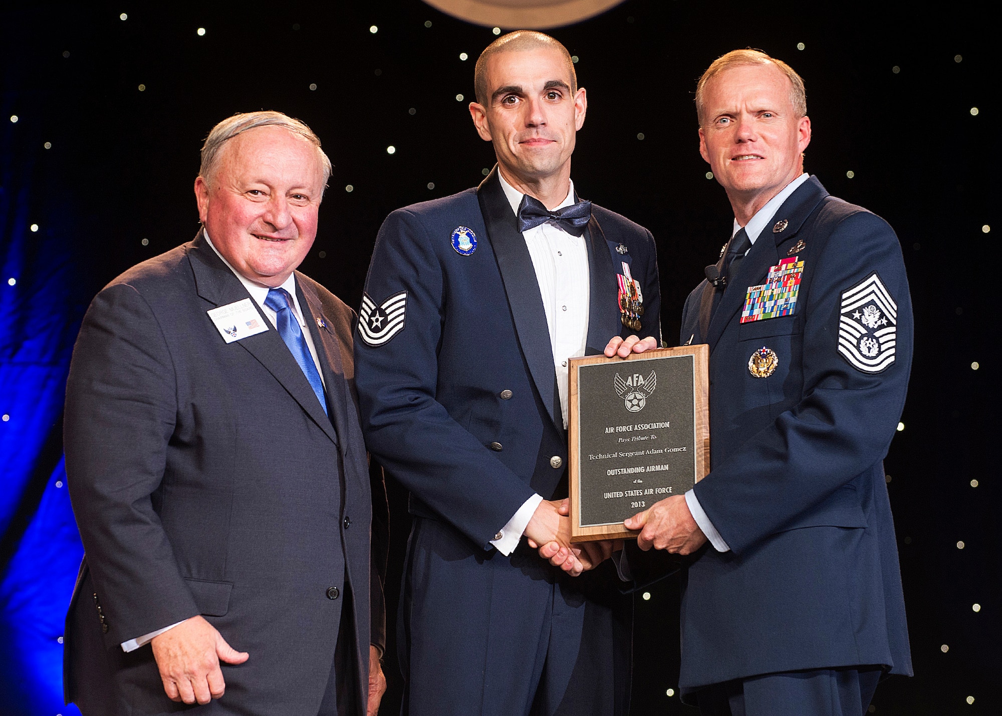 Tech. Sgt. Adam Gomez was recognized as one of the 12 Outstanding Airmen of the Year at a reception and awards dinner hosted by the Air Force Association during the AFA's annual Air & Space Conference and Technology Exposition Sept. 16, 2013, in Washington, D.C. The OAY award recognizes the top 12 outstanding enlisted Airmen for superior leadership, job performance, community involvement and personal achievements. Gomez is a cyber transport craftsman with the 3rd Combat Camera Squadron at Joint Base San Antonio-Lackland Air Force, Texas. (U.S. Air Force photo/Jim Varhegyi)