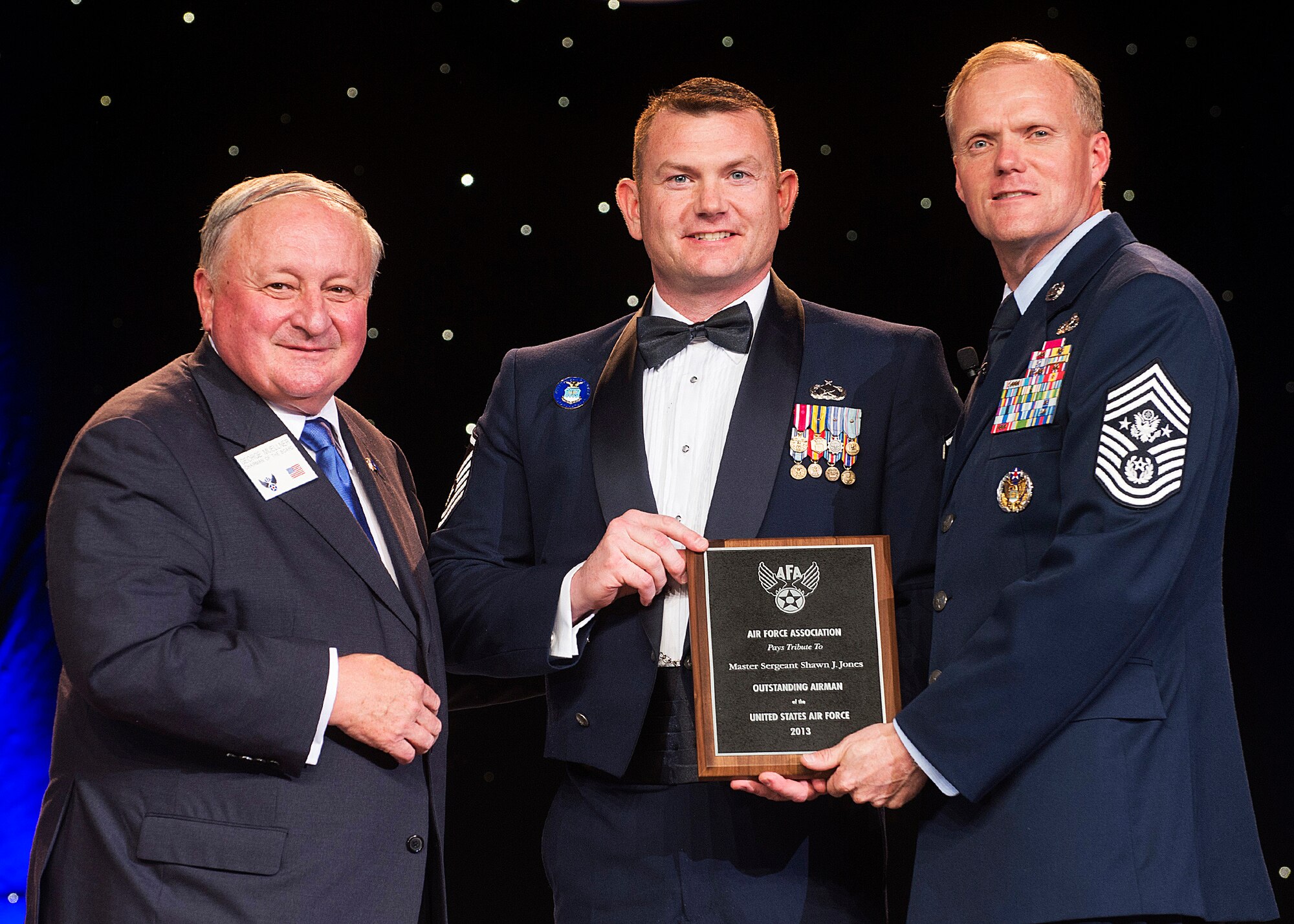 Master Sgt. Shawn Jones was recognized as one of the 12 Outstanding Airmen of the Year at a reception and awards dinner hosted by the Air Force Association during the AFA's annual Air & Space Conference and Technology Exposition Sept. 16, 2013, in Washington, D.C. The OAY award recognizes the top 12 outstanding enlisted Airmen for superior leadership, job performance, community involvement and personal achievements.  Jones is a photojournalist with the 514th Air Mobility Wing at Joint Base McGuire-Dix-Lakehurst, N.J. (U.S. Air Force photo/Jim Varhegyi)