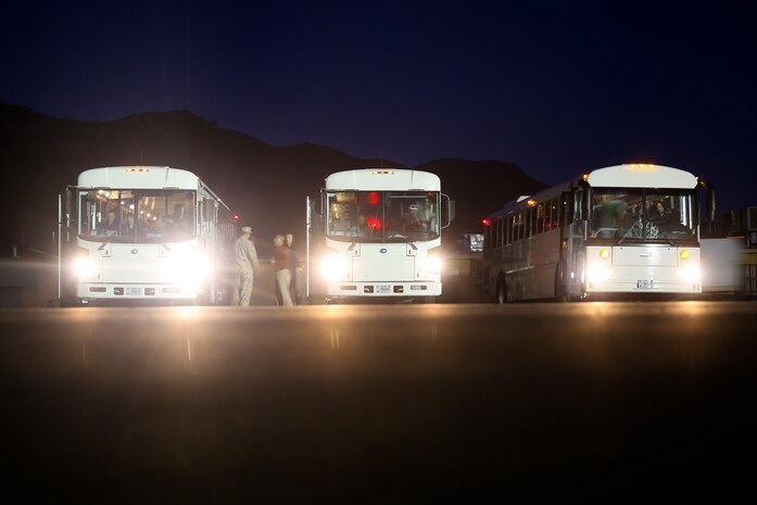 Buses loaded with Marines and sailors with Bravo Company, 1st Battalion, 1st Marine Regiment, wait to depart the Camp Horno parade deck here, Sept. 14, 2013. Servicemembers with the company spent the last several months training to provide security for an embassy in the Middle East. For many of the Marines this will be their second deployment in a year. The company returned from Afghanistan during 2012.