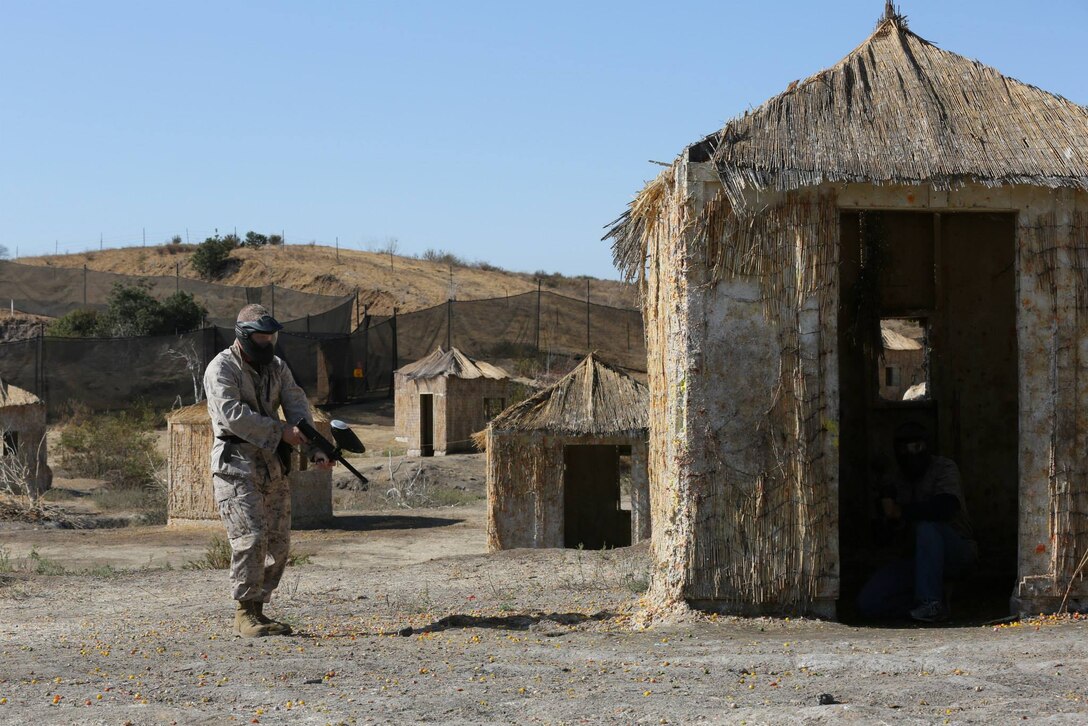 Career Recruiters with the 12th Marine Corps District play paintball as part of tactical training during a three-day recruiting seminar at Marine Corps Base Camp Pendleton, Calif., Aug. 10-12. Career Recruiters attend this seminar to develop professionally and learn methods of leadership. The three days include high intensity interval training (HIIT), various classes, tactical training and a mess-night.