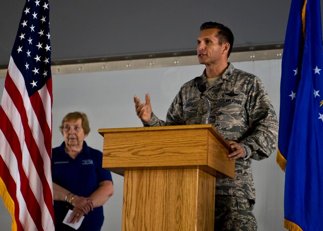 Col. Barry Cornish, 99th Air Base Wing commander, speaks to retirees during Retiree Appreciation Day at the Thunderbirds’ Hangar Sept. 13, 2013, at Nellis Air Force Base, Nev. Guest speakers for the event included Cornish; Col. (Dr.) Guillermo Tellez, 99th Medical Group commander; and retired Chief Master Sgt. James Lokovic. Lokovic, Air Force Sergeants Association’s vice chairman of the International Legislative Committee and the Legislative Affairs Trustee for AFSA Division 6.  He regularly travels to chapters throughout the AFSA to provide legislative and quality of life benefit briefings. (U.S. Air Force photo by Airman 1st Class Jason Couillard)