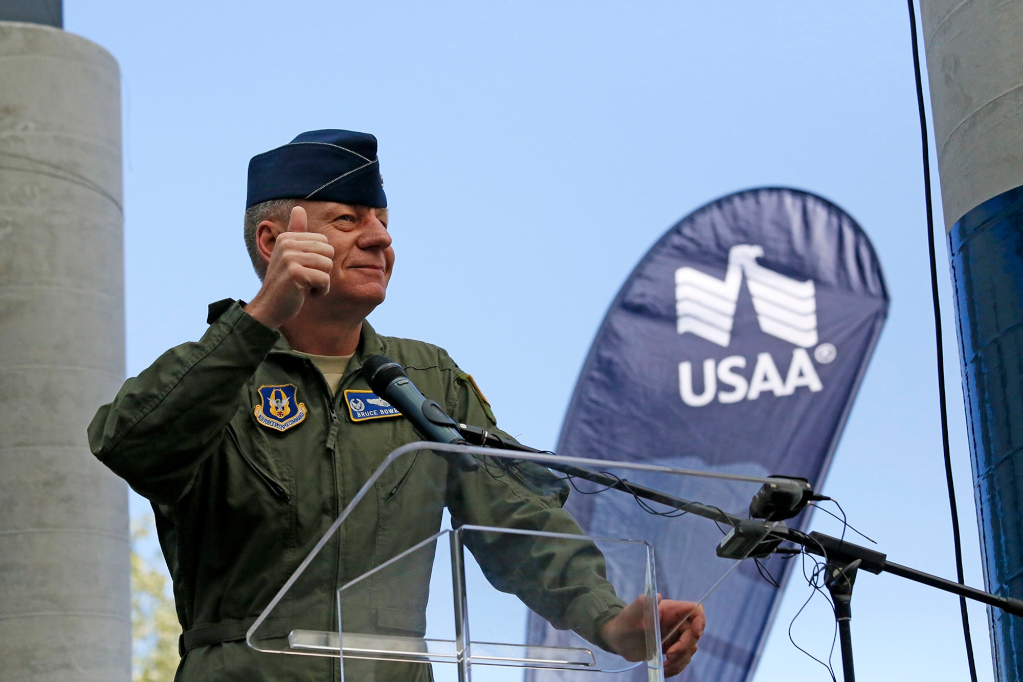 Col. Bruce Bowers, 446th Airlift Wing commander finishes giving his thanks to the Seattle Seahawks organization at the Warrior Zone, Joint Base Lewis-McChord, Wash., Sept. 10. The Seahawks officially adopted the 446th AW as their military unit of the 2013 NFL season. The Seahawks' "12th Man" flag was transferred to the 446th AW from the 4th Stryker Brigade Combat Team (SBCT), 2nd Infantry Division as part of a "change of command" ceremony. The players had a brief meet and greet with the Airmen and Soldiers before they departed. The flag will travel with the Citizen Airman all over the world until the 2014 season. USAA Insurance sponsored the event (U.S. Air Force Reserve Photo by Master Sgt. Jake Chappelle) 