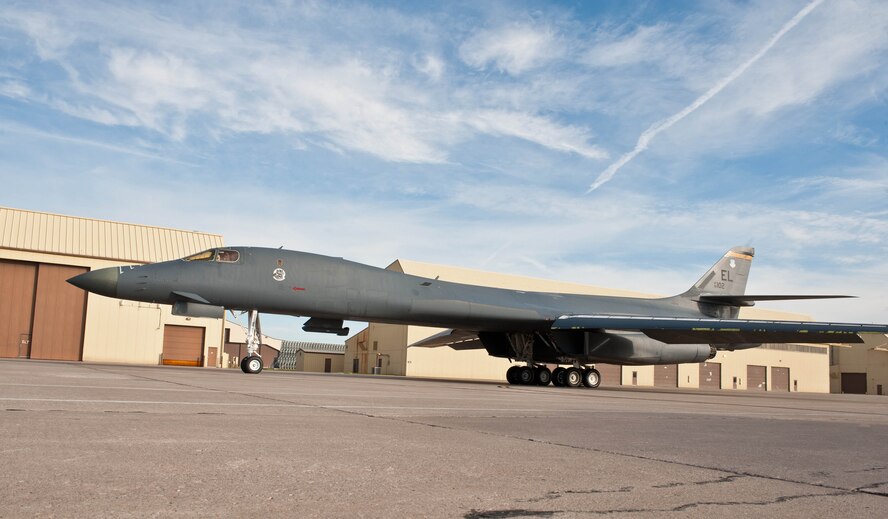A B-1 bomber taxis to a runway prior to taking off for a training mission at Ellsworth Air Force Base, S.D., Sept. 10, 2013. The B-1 is the backbone of America’s long-range bomber force, providing the ability to rapidly deliver massive quantities of precision and non-precision weapons against enemy forces. (U.S. Air Force photo by Airman 1st Class Zachary Hada/Released)