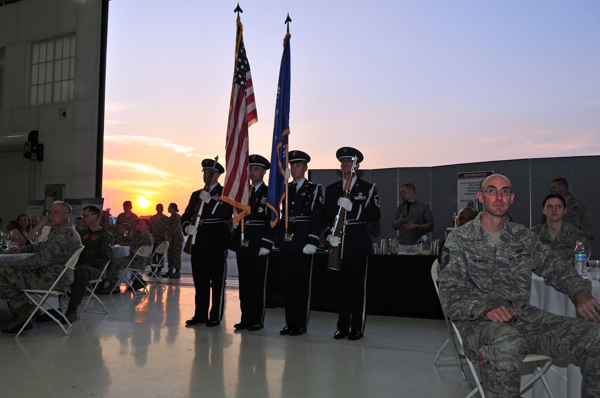 A Wisconsin Air National Guard honor guard prepares to present the colors during the 115th Fighter Wing's anniversary celebration at Truax Field, Madison, Wis., Sept. 7. The unit, which was established in September of 1948, celebrated its 65th anniversary over the September unit training assembly.(Air National Guard photo by 1st Lt. Stephen Montgomery) 
