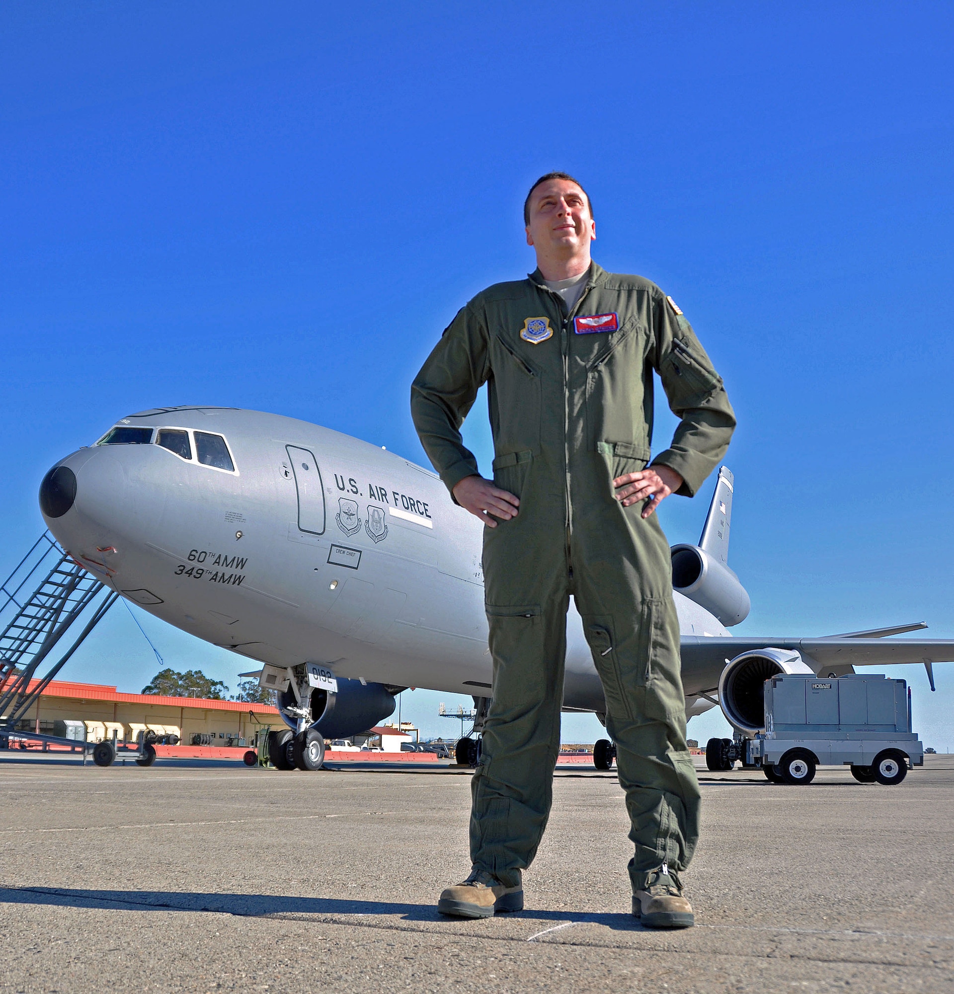 Capt. Derek Grenier, 9th Air Refueling Squadron KC-10 Extender evaluator pilot, stands in front of the airframe he has flown 266 combat sorties in and accumulated more than 2,200 combat flying hours. Grenier voluntarily disenrolled from the Air Force Academy in June 2001. After 9/11, he knew he needed to be a pilot in the Air Force and was granted re-admission. (U.S. Air Force photo/Senior Airman Madelyn Brown)